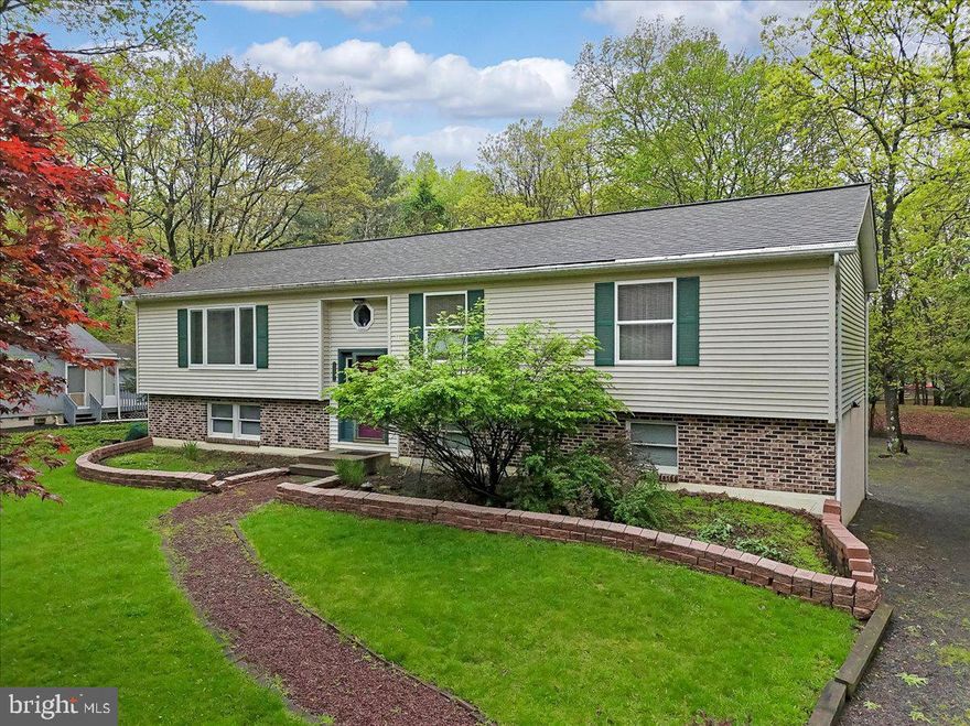 Come and take a look at this well Maintained Home in an Amenity filled Community . 5 Lakes ,2 outdoor pools, Tennis and Basketball Courts. Fishing Swimming and so much more this beauty has to offer. Spacious Living room with Propane Fireplace , Dining room and Large Kitchen with an Island for Preparation of your Meals. Wood Floors in the Main Areas of the Home. Spacious Family room with Skylights and lots of Window. Screened side porch which exits to the Wrap around Deck. Large Primary Bedroom and Bath., with 2 Other Good size bedrooms. Finish the Lower Level to your Liking. There is already a Half Bath Built in. Laundry Area is in Lower Level. Also Included is the Tankless Hot Water System with a back up tank system. Full home Water Conditioning System. Spacious oversized 2.5 Car Garage, to keep your Vehicles Dry in the winter. STR Friendly Community and Township. Do Your Own Due Diligence. Easy to Showing Using showing Time ICON. HOME IS FULLY FURNISHED.