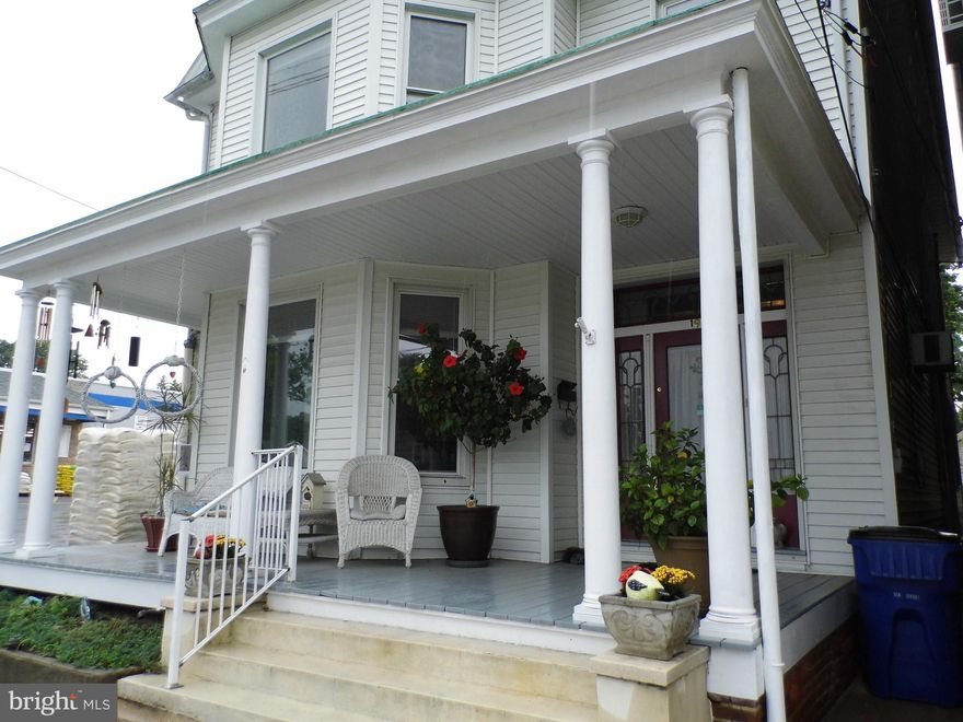 Beautifully maintained 1915 Victorian home in the heart of downtown Thurmont, zoned residential/commercial.  Large front porch with seating to enjoy the summer evenings. This home boasts original hardwood floors throughout and almost  10 foot ceilings on both floors. Kitchen and both bathrooms have new ceramic tile. Freshly painted and move-in ready. Enter into what is currently being used as an office area. Spacious  living room/family room area  with fireplace, gorgeous glass doors and tons of windows. Lovely staircase leading up to 3 huge bedrooms, full bathroom, big laundry room and sitting area off the master bedroom. Cute deck area right next to the hallway for morning  coffee.  Dining room is right off the kitchen and  also features a fireplace. Two rooms off the dining room currently being used for storage could easily be used as bedrooms.  Home also has 3 ceiling fans. Partially fenced in backyard perfect for entertaining. New Plumbing throughout less than 2 years ago. New Navien Heat System installed in 2017. New Kitchen wiring last fall. Detached 2 car garage in rear of home for parking off the street. Additional stairs case leading up to an attic that can also be used for storage or convert into additional living space.