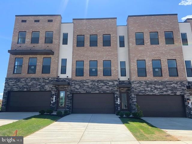 Brand new, End Unit Quick move in home! Move in this Summer in the Beautiful Renn Quarter Community! Amenities! Future Shopping! Walkability! Open Spaces! Trails! Creeks! And So, so Much More! The Renn Quarter by D.R. Horton is our newest and most sought-after Lifestyle community, located in extremely desirable Historic Downtown Frederick! Minutes from shopping, parks, and dog parks, Renn Quarter offers it all! Our amazing Auburn floorplan has soaring 9-foot ceilings, Standard Gourmet kitchen with stainless steel appliances, wall to wall luxury plank floors, hardwood stairs, spacious master bathroom, walk in closets and so much more! Nestled in the first section of D.R. Horton’s Renn Quarter community, this home is in walking/biking distance of Downtown Frederick! It is the last residential community that will be considered walkable downtown and is the location of the future Carroll Creek Walkway Extension. Not to mention this community will be amenity filled and you do not need to leave home if you don’t want to! Why not have all the conveniences and benefits of Historic Frederick, while living in a brand new, modern home? This home is a quick move in home and is ready to move in today. Contact us today to schedule a showing and to ask about our amazing features and closing costs assistance! We can help you get into your dream home!