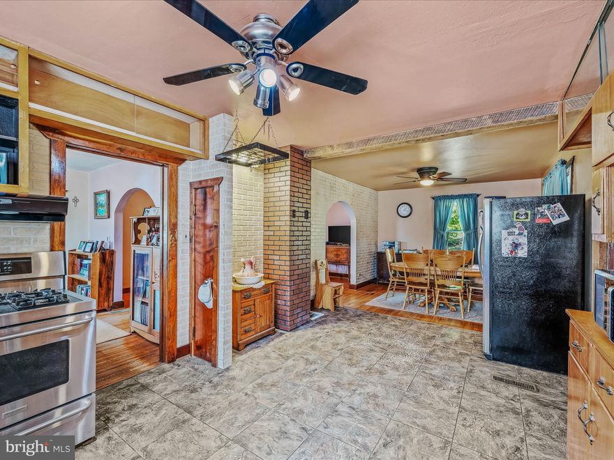 This location is more than meets the eye! Step into this timeless, classic Craftsman-style brick home with vintage charm and modern comfort. Located just minutes from downtown, this 3-bedroom, 2.5-bathroom gem has been thoughtfully maintained and offers 2128 sq ft of spacious living.
A sprawling covered front porch welcomes you, offering the perfect spot to watch a summer rainstorm.  Inside, warm hardwood floors flow seamlessly from the entryway into the living room and dining area, creating an inviting atmosphere throughout.
The kitchen has plenty of space with modern appliances-including a gas stove, plus ample room for an island. Off the kitchen, a bright sunroom offers the perfect space for reading, lounging, or bird watching, while the enclosed patio area just beyond is ideal for dining under the stars or hosting friends.
For pet lovers, the two fenced-in yard areas ensure your furry friends can play and roam safely. All three bedrooms are located on the upper level and feature real wood doors that add to the home’s timeless appeal. The full updated bath on the upper floor is stylish and functional.
The full basement provides plenty of extra space for hobbies, with shelving, a dedicated workshop area, and a half bath—perfect for clean-ups after DIY projects. Additional storage is available in the large space beneath the front porch, and there’s even a separate storage building off the back patio, ideal for stashing seasonal items or garden tools.
If you appreciate the character and quality of older homes that have stood the test of time, this one is sure to capture your heart. Don't miss your chance to own this unique and charming piece of history!  The once through street was gated off by neighbors so everyone has the benefit of more privacy and less traffic.