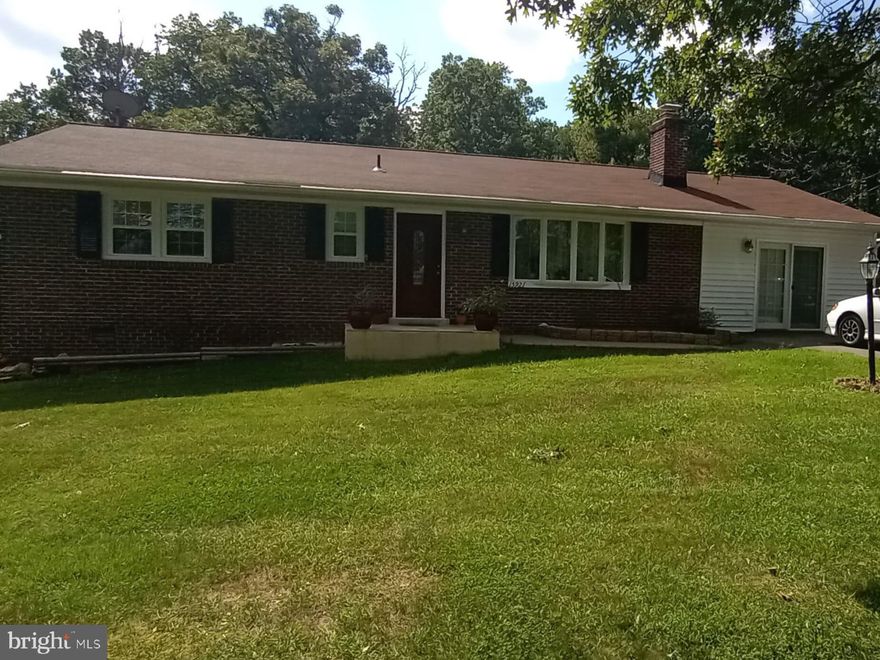 Welcomed to this Renovated Ranch on Nearly 1/2 Acre CORNER Lot at Base of Bull Run MTN *  * Original HARDWOODS in Living, Hall & All Bedrooms, Ceramic Tile on the rest of the house * SUN FILLED Living Room w/Bay Window & Fireplace * HUGE Eat-In Kitchen  with newer Appliances w/Lots of Storage * *SPACIOUS Bonus Room  that can be used as an Office or as a 4th bedroom * Screened Sunroom, freshly painted Deck * Upgraded Ceiling Fans, Blinds * Attic Access * Storage Bin, Shed & Carport ,* Well maintained back yard with  various fruit trees * As an added convenience the School bus stop is currently right in front of the Driveway.