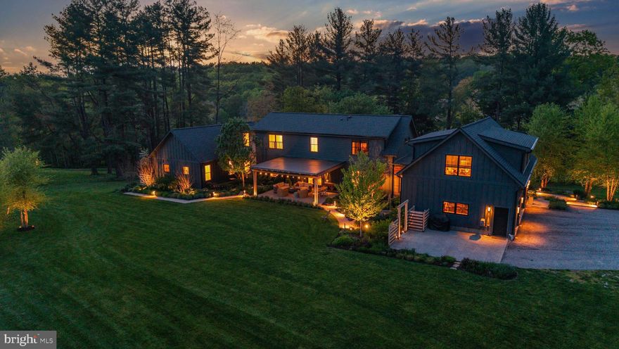 ESSENCE
Live authentically. Welcome to Wild Pines, located in Sparks Glencoe in Baltimore County’s rolling farm country. This modern mountain retreat is named after the evergreens that surround it. Courtyard architecture reimagined... three buildings in a horseshoe shape that create immersive outdoor spaces to commune with the flora and fauna. Intentional spaces organized off a central lung... relish the meditative state of being here. Biophilic design. Let nature lead. An elemental symphony. The great room is perched to connect with the lush pines from a framed view. Life is a canvas. Paint it. Soothing spaces that offer calm and clarity. Hawks, owls, hummingbirds, eagles, woodpeckers... oh my! Explore the great outdoors and hike the trails. First floor owners suite serves as sanctuary. Incredible work from home suite with private access. Multiple spaces for long term guests. Excellent for multi generational living. An original creation by a design build couple. A cocoon of privacy convenient to everywhere you want to be. Xfinity internet. Cultivate your existence. The art of uniting human and home.

LOCAL FLAVOR AND PROVISIONS
John Brown Store and Wegmans. Favorite local dining at The Milton Inn, The Oregon Grill, The Butler Cabin, and The Filling Station. An exit north offers Graul's Market along with Casa Mia’s, Manor Tavern, The Fill'Er-Up, The Yellow Barn, Woodfire Kitchen and The Creamery Connection. Tap into local breweries, such as Inverness Brewing, Farmacy Brewing and Big Truck Farm Brewery.

OUTINGS AND LEISURES
Explore the NCR Trail. A 21-mile flat, crushed-stone trail open to hikers, bikers, and horses, it runs along the scenic Gunpowder Falls river. Minutes to Prettyboy Reservoir. This area is open to hiking, rowing, or paddle boating, bird watching, horseback riding and nature photography year-round, and for archery hunting during a regulated season. Go tubing on the Gunpowder River. Enjoy Ladew Topiary Gardens... these gardens are 22 acres of spectacular, award-winning gardens, more than 100 remarkable topiaries, a mile-long Nature Walk, and native Butterfly House. Explore The Manor Mill, a pre-revolutionary grist mill that now houses a wide variety of art and entertainment events. Tee off at Greystone Golf Course in White Hall. Or visit The National Lacrosse Hall of Fame and Museum which honors the history and legends in the sport. 

PROXIMITY
Zippy access to the I-83 on ramp, about 8 minutes to Hunt Valley, and about 18 minutes to Towson. 45 minutes to BWI and 23 minutes to Penn Station.

REGION
Sparks Glencoe is known for its scenic rural landscape, and historic charm. The original 1916 Sparks State Bank now serves as a Nature Center.