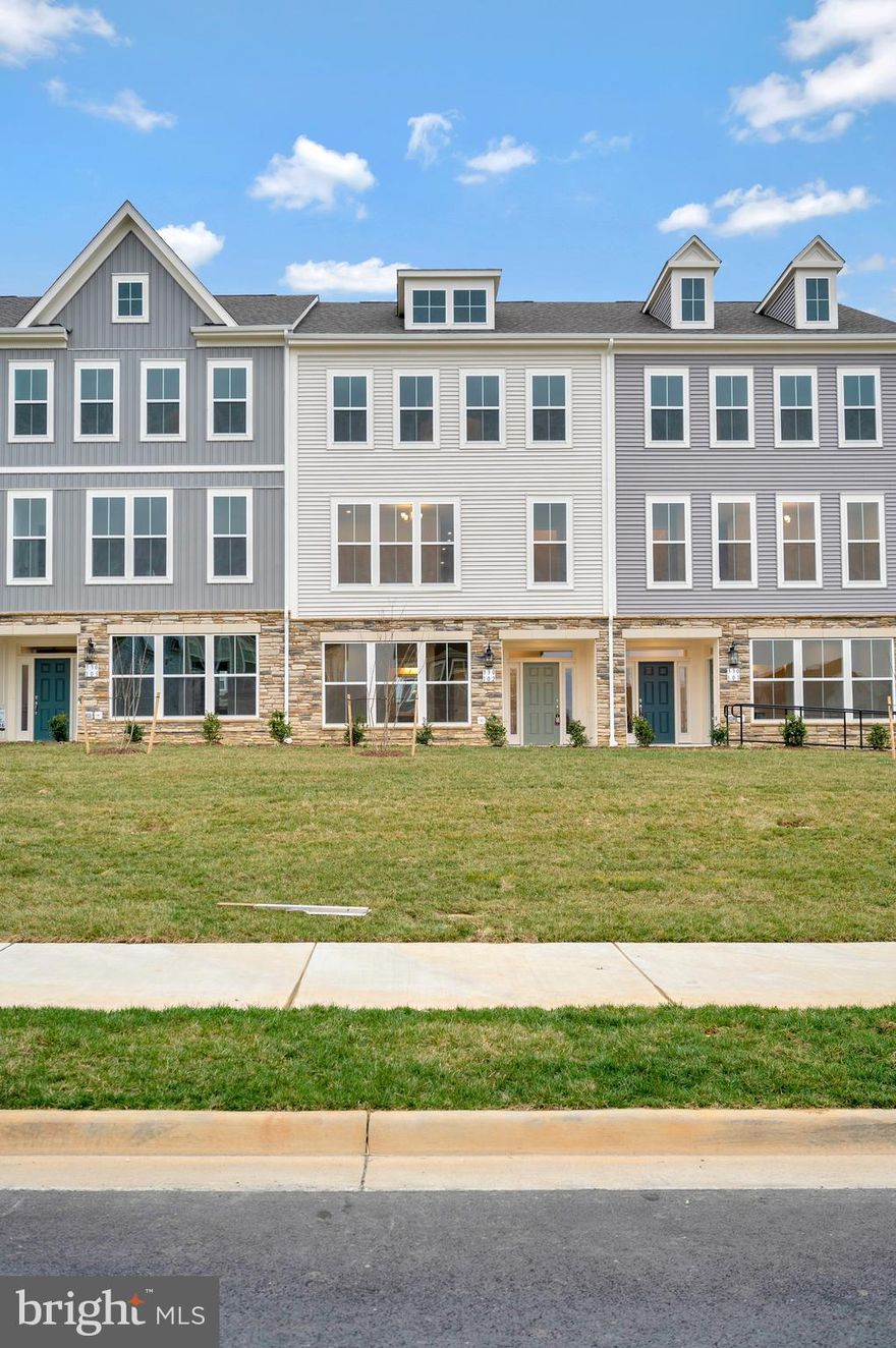 Not even a year-old townhome in Embrey Mill that brings work and life together. With relaxed designs that are more than just a look, but a feeling that extends beyond your four walls. Embrey Mill’s everything lifestyle rises to any occasion.  These brand-new townhomes come with a two-car garage, paved driveway, and a deck. You will fall in love from the moment you walk in. This is an interior unit full of natural light, spacious, and has a wonderfully appointed kitchen with stainless steel appliances, a center island, and a pantry. The kitchen is the center of the home and will make entertaining a breeze. The owner's suite has its en-suite bath with a double vanity and a large walk-in shower. Two more bedrooms, another full bath, and the laundry area finish the upper level. All of this plus a separate office, featuring its entrance and a half bath. Enjoy the quiet as you work from home.