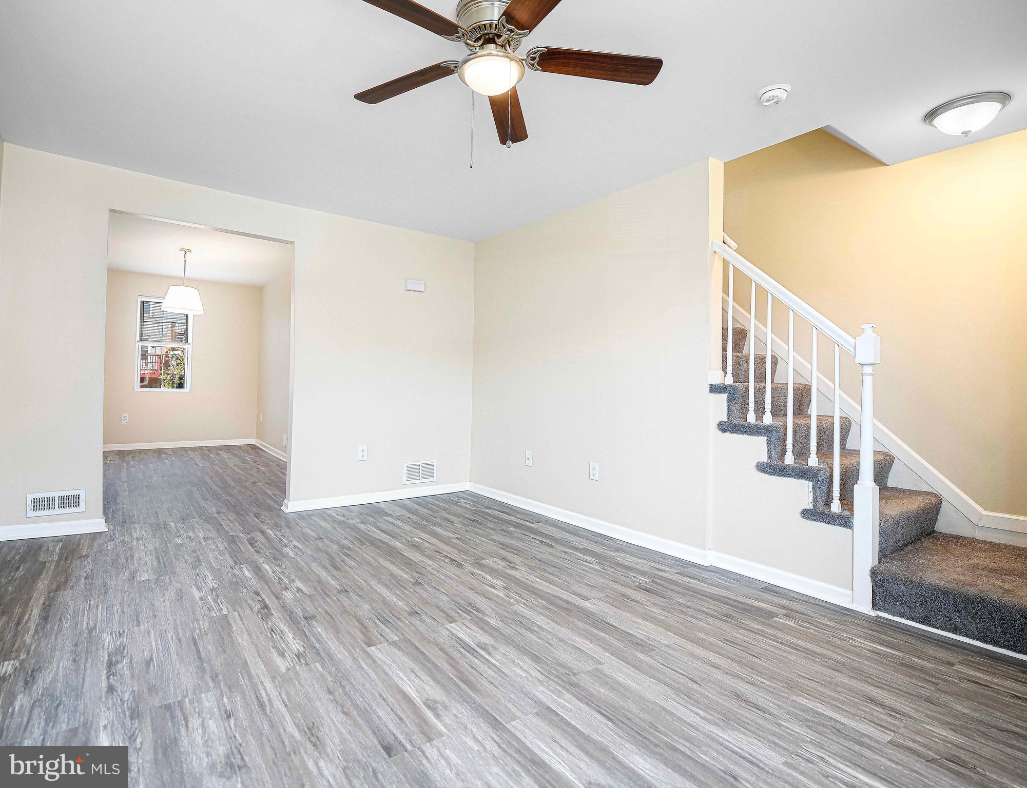 This stunning end of group rowhome features many recent updates. LVP flooring throughout, new cabinets and granite countertops, stainless steel appliances, and new paint give this home a bright and modern feel. However, the real value is in the details. All of the windows have been replaced, new doors, new HVAC, and new washer and dryer make this home truly move in ready. On the upper level, the bathroom has been updated with a new tub/shower, toilet and vanity. The lower level has been freshly finished with new flooring and paint and provides ample space to spread out. A brand new deck walks out to the rear yard that includes a shed and a private parking area. This home is just minutes away from the famed Pimlico race track and is a great convenient location to get downtown!