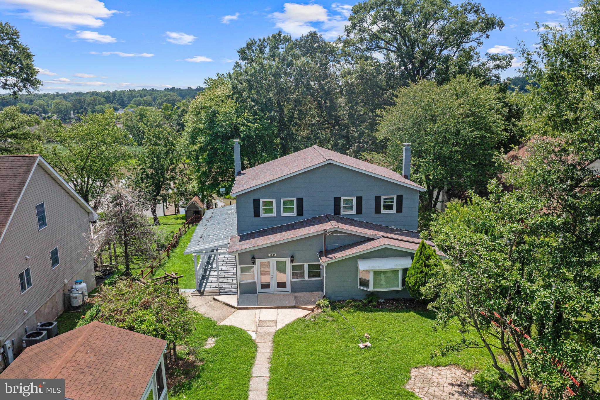 Discover this rarely available 6-bedroom, 3.5-bath home offering panoramic water views along the serene Bird River, just outside Baltimore. Thoughtfully updated and move-in ready, this expansive residence offers the perfect blend of comfort, function, and natural beauty.Step inside to a welcoming foyer that flows seamlessly into a spacious living room and an oversized dining area—each enhanced with brand-new luxury vinyl plank flooring. The remodeled kitchen is a chef’s dream, featuring 42” cabinets, stainless steel appliances, and sleek quartz countertops.The main level boasts two well-sized bedrooms and 1.5 bathrooms—ideal for single-level living. Upstairs, you’ll find three additional bedrooms and a cozy upper-level living room with direct access to a private balcony, where sweeping river views await.Two laundry hookup areas give you flexible options for washer/dryer placement. The large basement offers a versatile family room with rough-ins for a wet bar, two additional rooms perfect for guest bedrooms, home offices, or creative spaces, and a utility room for added storage.Additional highlights include a new architectural shingle roof, freshly painted siding, dual-zoned HVAC systems, a multi-car parking pad, and a 1-car garage with an attached screened-in patio. A rear deck overlooks the spacious backyard and tranquil waterfront—perfect for relaxing or entertaining.This is your chance to own a piece of waterfront paradise. Schedule your private tour today!