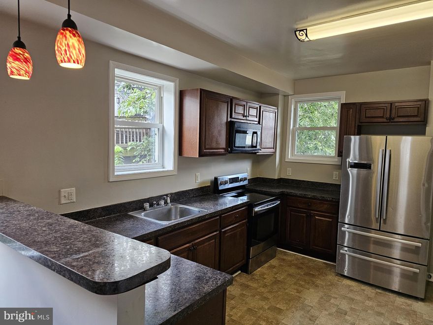 Investor Alert!!! Great investment opportunity with this 3 Bedroom end unit! Potential rent $1400-$1500/mo., property taxes - $1150/yr. Lead-free.  LVP flooring throughout, gourmet kitchen with bar/pendant lighting, new HVAC with CAC in 2024.  Fenced rear yard with deck. Freshly painted. Close to public transportation and shopping.  Frederick Elementary School within walking distance.
Ready to show on 7/16/25