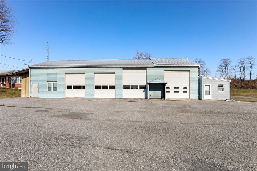 **Commercial Investment Opportunity with Multiple Income Streams**
Highly visible commercial investment property on Lincoln Way West offering excellent exposure and strong potential for business owners or investors. The property includes a three-bay auto service garage/lube center with a convenient pull-through design, a grease pit, and oversized mechanic bays, providing ample space for automotive service, repair, or similar commercial use.  The building also offers additional storage space and ample parking for customers and equipment.
In addition to the commercial building, the property features built-in income sources. A tenant-occupied 3-bedroom, 1.5 bath ranch home is included with the sale, providing steady rental income, along with annual revenue from Kegerreis outdoor billboard located on the parcel.  
With high traffic visibility, multiple income streams, and commercial flexibility, this property is an excellent opportunity for anyone looking for an income- producing commercial property in a well traveled location.