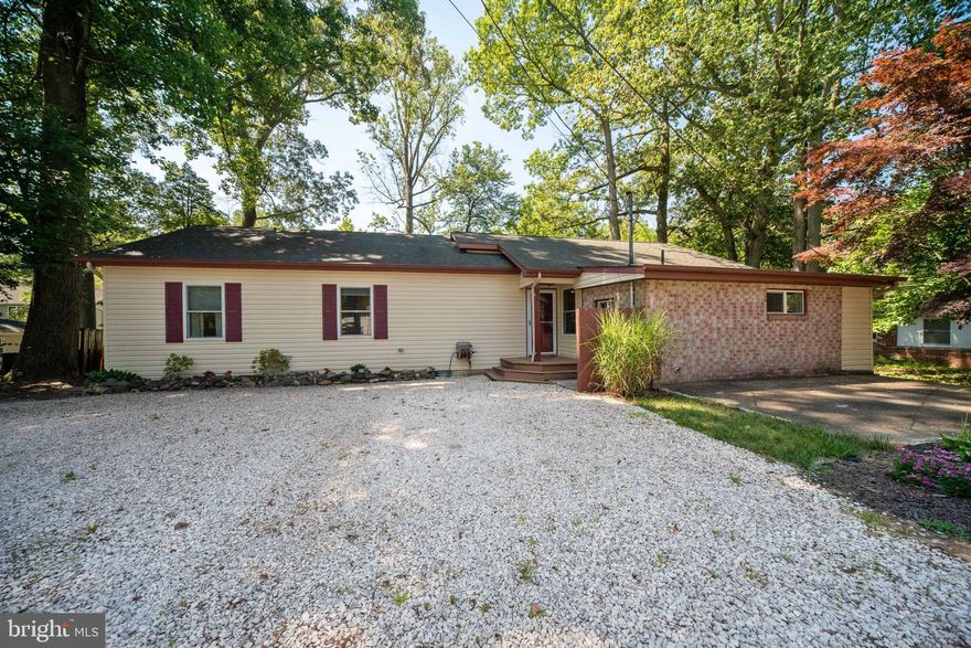 Spacious Turn Key Ready Rancher in desirable water privileged Herald Harbor! Generous Open Floor plan; boasting vaulted ceilings with 4 spacious bedrooms and 3 full baths, including Master Suite w/ custom W/I closet, and beautiful master bath, french doors to large deck and fenced back yard featuring a stone entertainment area with fire pit and separate storage shed with electric. Kitchen/living/dining open with bonus bar area.