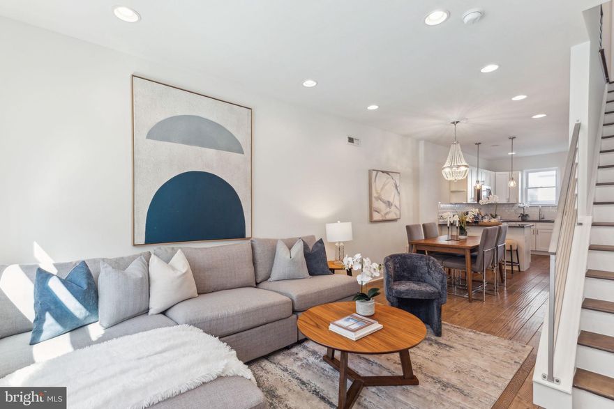 Nestled in the heart of Pennsport, this beautifully updated, move-in-ready home perfectly combines modern comfort with the charm of its vibrant neighborhood. From the moment you step inside, you’ll be greeted by a bright, freshly painted interior and an open-concept layout, designed for both everyday living and effortless entertaining. With a double tier rooftop deck, a finished basement and storage galore and more this home is a one of a kind, hard to find gem! The first floor welcomes you with a spacious living room, featuring hand-scraped hardwood floors that flow seamlessly into a dining area. At the rear of the home, a stylish L-shaped kitchen awaits, outfitted with sleek white shaker cabinets, granite countertops, stainless steel appliances, a subway tile backsplash, and a convenient pantry. The breakfast bar, adorned with chic pendant lighting, offers the perfect spot for your morning coffee or casual meals. Step outside into your private backyard, a rare find in the city, offering space for grilling, gardening, or simply relaxing in your own outdoor oasis. The finished basement adds even more flexibility to this home, providing space for a home office, media room, or playroom for the kids. Plus, the separate laundry room and additional storage ensure you have all the space you need for daily life.Modern steel railings lead you upstairs to two spacious bedrooms, each with generous closet space, and a shared full bathroom boasting sleek, contemporary finishes. On the top floor, you'll find your private primary suite—a true retreat. The spa-inspired bathroom features a seamless glass shower with a rain shower head, along with a custom walk-in closet. Thoughtfully designed, the suite even includes second-floor laundry hookups for added convenience.Take your relaxation or entertaining to the next level on the private roof deck, offering breathtaking panoramic views of the city skyline and bridges, plus front-row seats to the city’s famous fireworks shows.Location couldn’t be more ideal—just blocks from Target, Giant, Lowe’s, and the big-box stores along Columbus Boulevard, this home places you steps away from some of South Philly’s most beloved local spots. Savor neighborhood favorites like Federal Donuts, Mifflin Tavern, and the creative, Mexican-inspired pizzas at Tonalli. Don’t forget to visit O’Jung’s  for an Arctic Splash -a unique treat! Dickinson Square Park, with its weekly farmers market and popular playground, is just a few blocks away, while Herron spray ground offers a perfect summer cool-off spot. With easy access to I-95, 676, and SEPTA transit options, this home delivers the perfect blend of urban convenience and neighborhood charm. This home is conveniently located just a 6-minute walk from the free parking lot on Tasker street under 195, making parking a breeze. Plus, it comes with a tax abatement for a few more years, making it even more desirable. With its seamless blend of thoughtful amenities, spacious design, and unbeatable location, this home is the best home on the market in Philly!