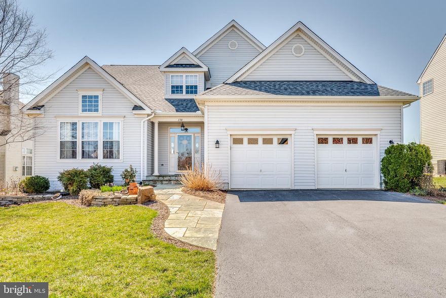 Price Dropped.  Great buy!!   4 Bedroom 3.5 Bath. Gorgeous interior ** Wood floors, crown molding and an open floor plan. The layout and architectural details give each room in the common area definition within a  large and open space with high ceilings ** vaulted in family and living room *** giving this elegant home a cozy inviting feel. The Large foyer leads to the family room (gas fireplace) and dining/living room. Big island kitchen with lots of storage and an attached breakfast room full of light (dream space for plants).There's a pass through from kitchen to family room which opens to back deck and fenced backyard. Large First floor Master Bedroom Suite that opens to outside deck plus 2 other bedrooms on main level and a fourth bedroom on the upper level. The upstairs loft overlooks the family room. And the basement is ginormous. Part of it is paneled -- make a great game room. Can't beat the location especially if you commute. I promise you'll fall in love with this space so come take a look. The floor plan is one of the best I've seen.