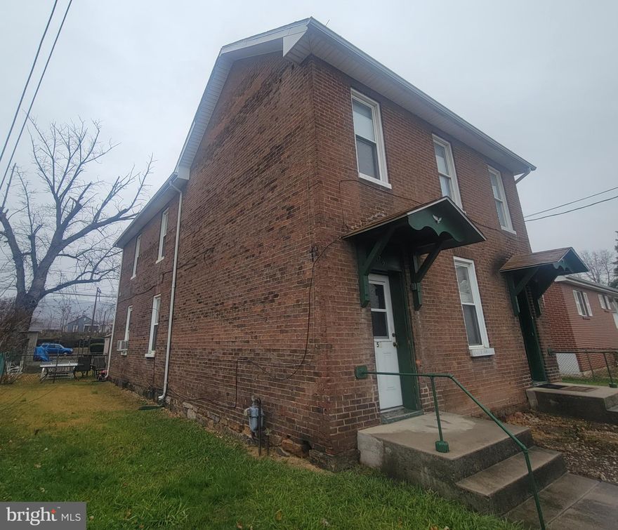 Own your own home and have someone else help make your mortgage payments. This duplex features two one bedroom apartments. Live in one and rent out the other one for additional income or rent both units for a terrific investment. The property can also be converted back to a single family home.  Upstairs unit has been updated with new flooring and new appliances. There is a level, partially fenced back yard with off street parking.  Located in Ridgeley WV close to Cumberland MD. Owner is willing to offer some seller financing.