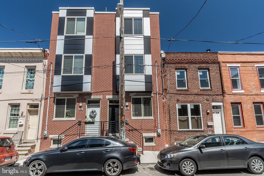 Welcome to 2133 Mountain Street! This 3 bed, 2.5 bath home located in Point Breeze is ready for you to call home. Walk into your open living/dining area and take notice of the stunning hardwood floors that run throughout the home complete with lots of natural light. The open concept floor plan leads you right in to your large and spacious kitchen with quartz stone counters, white shaker cabinets, stainless steel appliances for the gourmet chef in you. An enclosed back yard and powder room top off the main floor! Walk upstairs to find two well-sized bedrooms, a shared half bath and laundry area. On the third floor you will find a large and spacious master bedroom and en suite bathroom, beautiful walk-in closet. Finished basement offers plenty of space for entertaining guests or could be used as additional living space. Take the spiral staircase up the roof deck with stunning 360 degree views of the city. Located on a quiet street in Point Breeze, quick access to 76, easy access to public transportation - broad street line, frequent buses, short ride to UPENN Hospital/Campus, Nearby restaurants include Chicks, On Point Bistro, Dockside Brewery, American Sardine Bar. Blocks away from Passyunk Ave. 5 Years remaining on the tax abatement ! Offering 2 year home warranty for the buyer ! This home is a must-see!