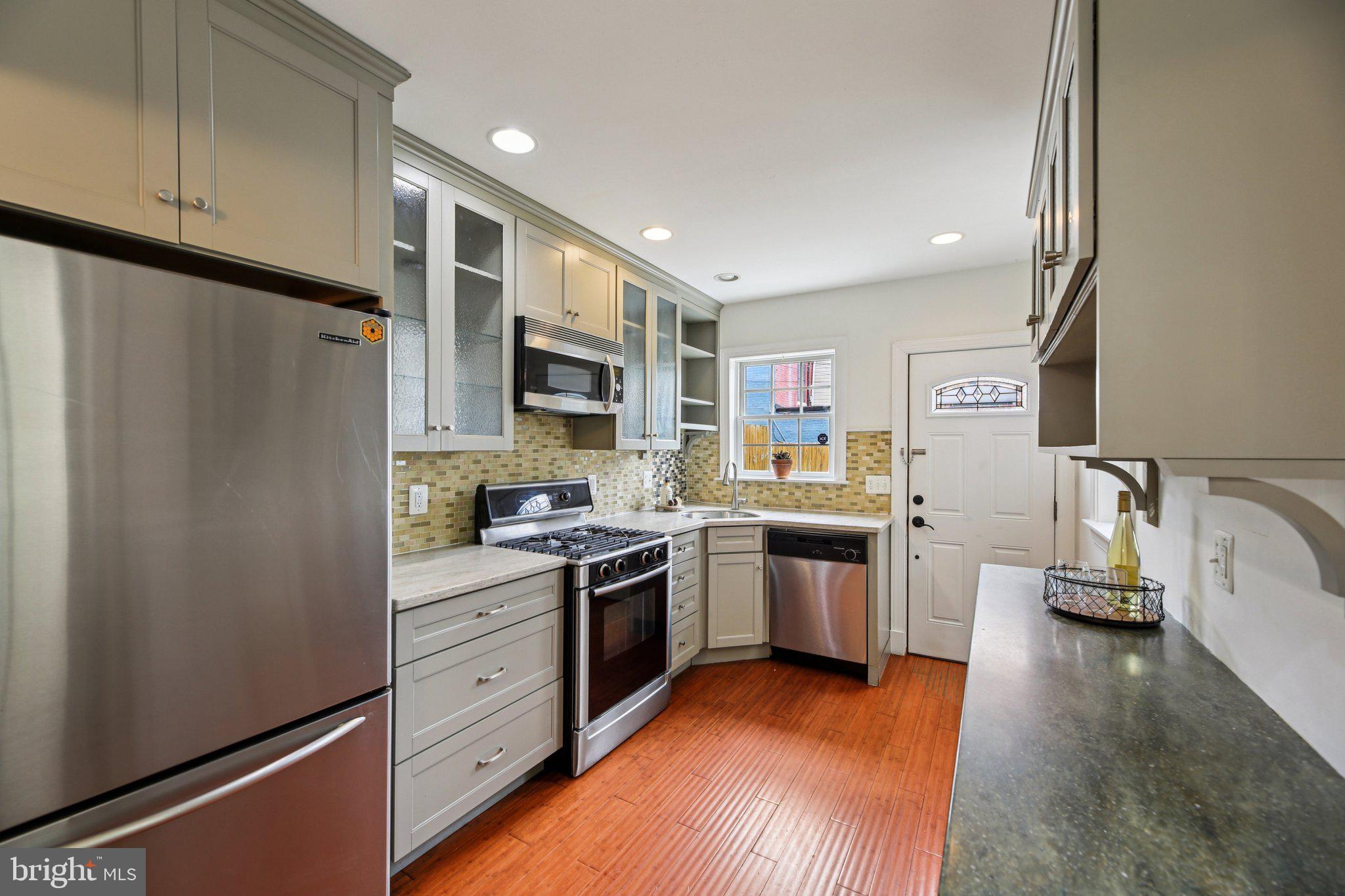 NEW PRICE! Live steps away from the heart of Patterson Park in this charming 3-bedroom, 2.5-bath townhome. Wake up to the park right outside your door, where you can enjoy morning walks, weekend markets, and year-round community events. Inside, exposed brick walls and hardwood floors bring classic character, while modern updates add comfort and style. The rooftop terrace is the perfect spot to take in city sunsets, and the fenced backyard with a porch and storage shed gives you space to relax or garden. Just a short stroll to local coffee shops, restaurants, and neighborhood favorites, this home offers the best of city living with green space as your front yard.