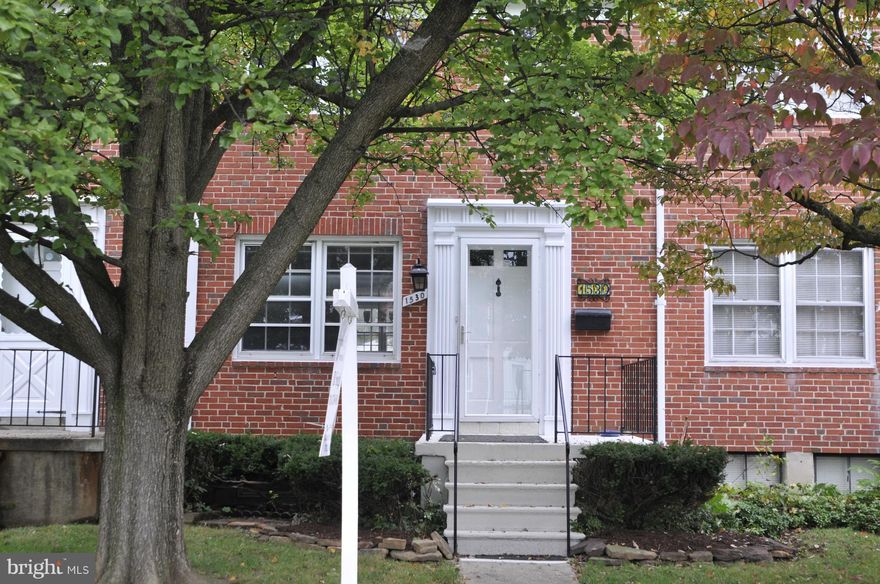 UPDATED 3 BEDROOM 1.5 BATH TOWNHOME IN SOUGHT AFTER EDMONDSON HEIGHTS...............BRAND NEW KITCHEN WITH S/S APPLIANCES AND QUARTZ COUNTER TOPS.......FRESHLY PAINTED...........BEAUTIFUL HARDWOODS THROUGHOUT....BRAND NEW HVAC.....LARGE FINISHED BASEMENT.............ALL OF THIS ON A BEAUTIFUL LOT.........PARKING PAD AND MULTI LEVEL DECK WITH BUILD IN BENCHES  .6 FT PRIVACY FENCE IN THE BACK.