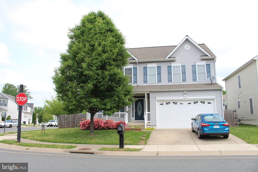 Very Spacious! Main level has 9' ceilings.  Sep. Dr,  large eat-in kitchen and huge  FR with fireplace.  4  bedrooms upstairs with large master and large 2nd br. Laundry on upper level. Master BR has tray ceiling and luxury bath with separate shower and jetted tub. 5th br, full bath and huge RR in basement that walks up to fenced yard. Deck and 2 car garage. 1 small dog only with $50 per month pet rent. Trash and front yard maintenance included.