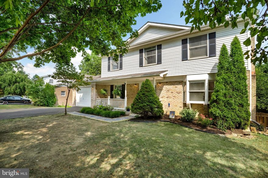 Welcome to Wakeland Manor! Over 2800 sq ft of living space in this mostly brick constructed colonial situated on a quiet cul de sac lot with mature landscaping, covered front porch, large rear deck, storage shed, and a fully fenced back yard.  Recently updated open kitchen, white cabinets and tile, fresh counters, stainless steel appliances and updated fixtures.  You can eat at the bar between kitchen and dining room. Living room with bow window, Family room with  brick fireplace, currently has an insert which can be easily removed to resume wood burning. Hardwood  carries thru main level and upper level.  Fully finished walkout basement with half bath and wet bar to enjoy entertaining in the back yard!  Large Primary Bedroom with bath and walk in closet and good sized secondary bedrooms on the upper level.  Driveway freshly resealed and trees were just professionally trimmed.   This home has no HOA and is located in a desirable, commuter friendly location.