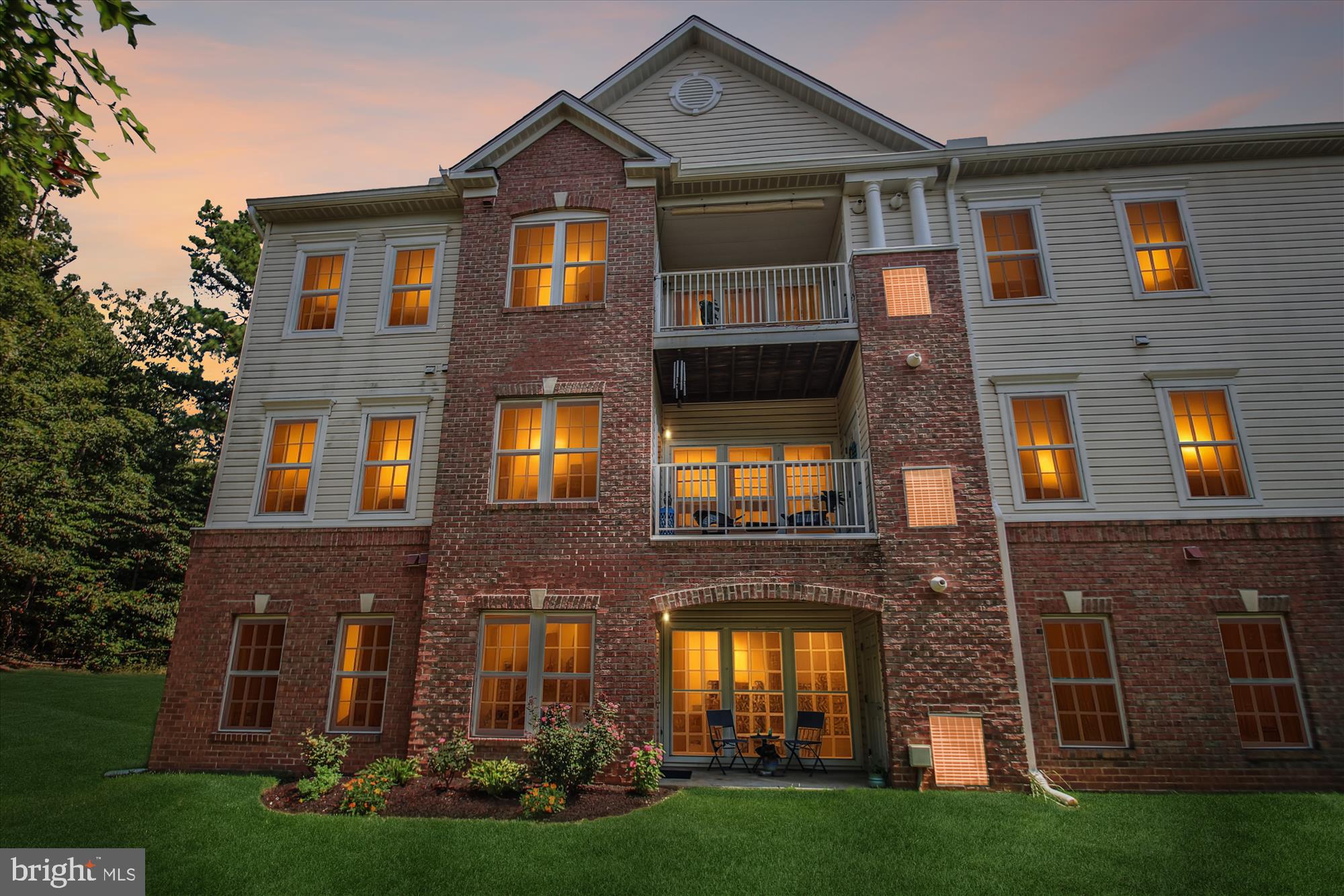 Welcome to this beautifully maintained, light-filled condo in the gated Piney Orchard community of Odenton. This spacious 2-bedroom, 2-bath unit also features a versatile den - perfect for a home office, guest or hobby space. One level living and this unit has a private setting, with patio overlooking the beautifully manicured common space, providing peaceful views and direct access to green space. The open floor plan includes a stylish kitchen with granite island and countertops, and stainless steel appliances - ideal for both everyday living and entertaining. Additional features include modern paint colors throughout, crown and chair rail molding, and hardwood flooring. The spacious primary suite offers two generous closets and abundant natural light. The second bedroom is impressively large and features a good-sized closet, making it ideal for guests or extra storage. Enjoy resort-style living with access to amazing amenities, including outdoor pools, indoor pool, fitness and community centers, athletic fields, and miles of scenic walking and biking trails. All this, just minutes from major commuting routes, Ft. Meade, the MARC train station, and endless dining, shopping, and entertainment options. Don’t miss your opportunity to live in one of Odenton’s most desirable communities!