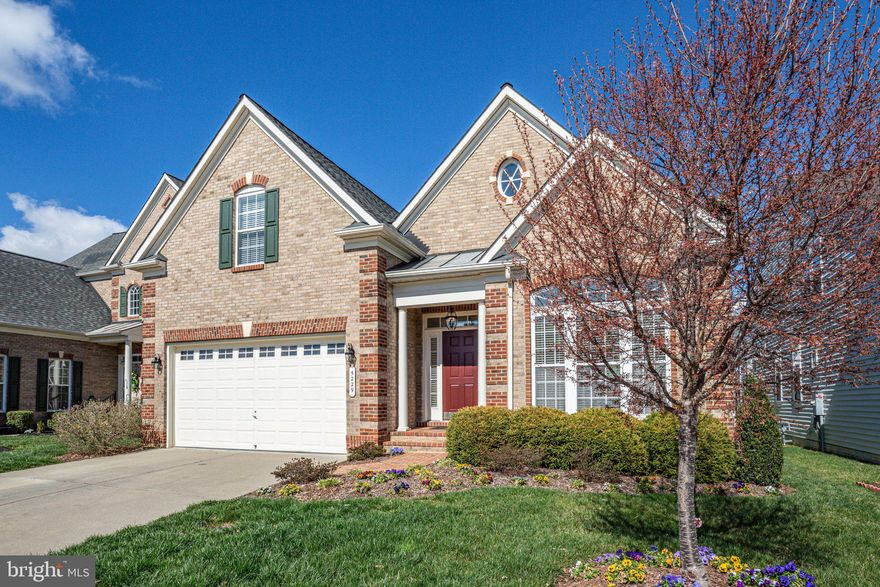 You’ll LOVE this IMPECCABLE brick front NV Bornquist residence offering luxury Adult living! Brick walkway with low-rise steps create a magnificent entrance to this incredible home with upgrades galore! Gorgeous REAL maple floors, NEW carpet, and FRESH paint throughout! Spacious Main Level Living offers 2500 sf on the main level!   Meticulously maintained utilities include Dual Zone HVAC for efficient comfort!  Lit art niches!  10 ft ceilings!  Fabulous Great Room with gas Fireplace & Kitchen with island! RECENT upgraded brush Stainless Steel appliances highlight the light toned granite countertops. Formal Dining Room! Office/Living Room with French Doors! Luxurious Main Level Primary Suite has Sitting Room with HUGE Primary Closet (nearly 50ft of storage), dual vanities, both Shower and deep Soaking Tub!! Main Level also offers the guest Bedroom, Full Bathroom, and laundry room.  BONUS:  Additional Bedroom En-Suite on the 2nd Level.  Let your imagination run wild in the impressive unfinished 2500sf basement providing room for EVERYTHING: rough-in for a full bathroom, storage, wood-workers shop, grandkids’ play area or your heart’s desire! Private EZ Breeze Sunroom, off Great Room, leads to grilling low-maintenance deck with stairs to backyard! Virginia Heritage is a highly sought amenity filled community offering a multi-use community center/clubhouse, indoor/outdoor pools, pickleball/tennis courts, bocce ball, game rooms, gym/exercise area, community events and activities…and so much more!   Virginia Heritage HOA offers FIOS Internet, Cable and a variety of social and fitness options. Close to shops, Publix, Spotsy Hospital & the new VA Medical Facility (currently under construction), VRE.  Just 6 miles to historic Fredericksburg and UMW. Don't miss this incredible home - See it Today!