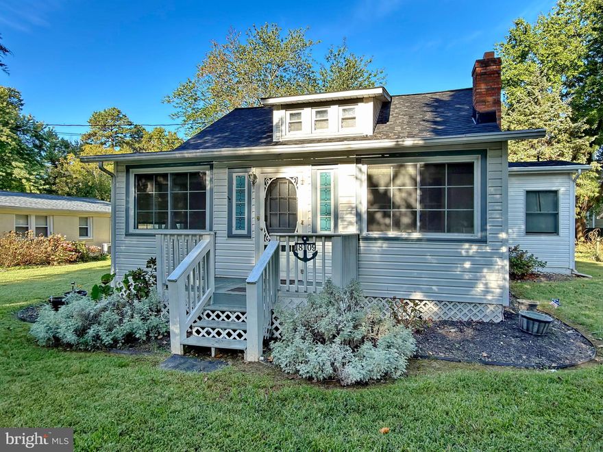 Welcome to this charming updated move in ready, fully furnished cottage located on Cobb Island.  Whether you are looking for a full time home or a weekend retreat this one's for you.  This two bedroom, two bathroom home has had many updates over the past five years to include the following: (2021) new windows, front & back, new kitchen appliances, gutter guards, electronic door lock, updated flooring, interior of house fully painted, hardwood flooring installed in three-season porch, reinforced back deck (2023) new washer and dryer (2024) new HVAC system with smart thermostat (2025) new roof installed .  The work is all done so you can relax and enjoy the large deck over looking your tree lined back yard.  A few amenities Cobb Island has to offer include a local boat ramp, restaurants, a market , many community events and amazing sunsets. Cobb Island is a golf cart community. Swan Point golf course is less then 5 miles away.