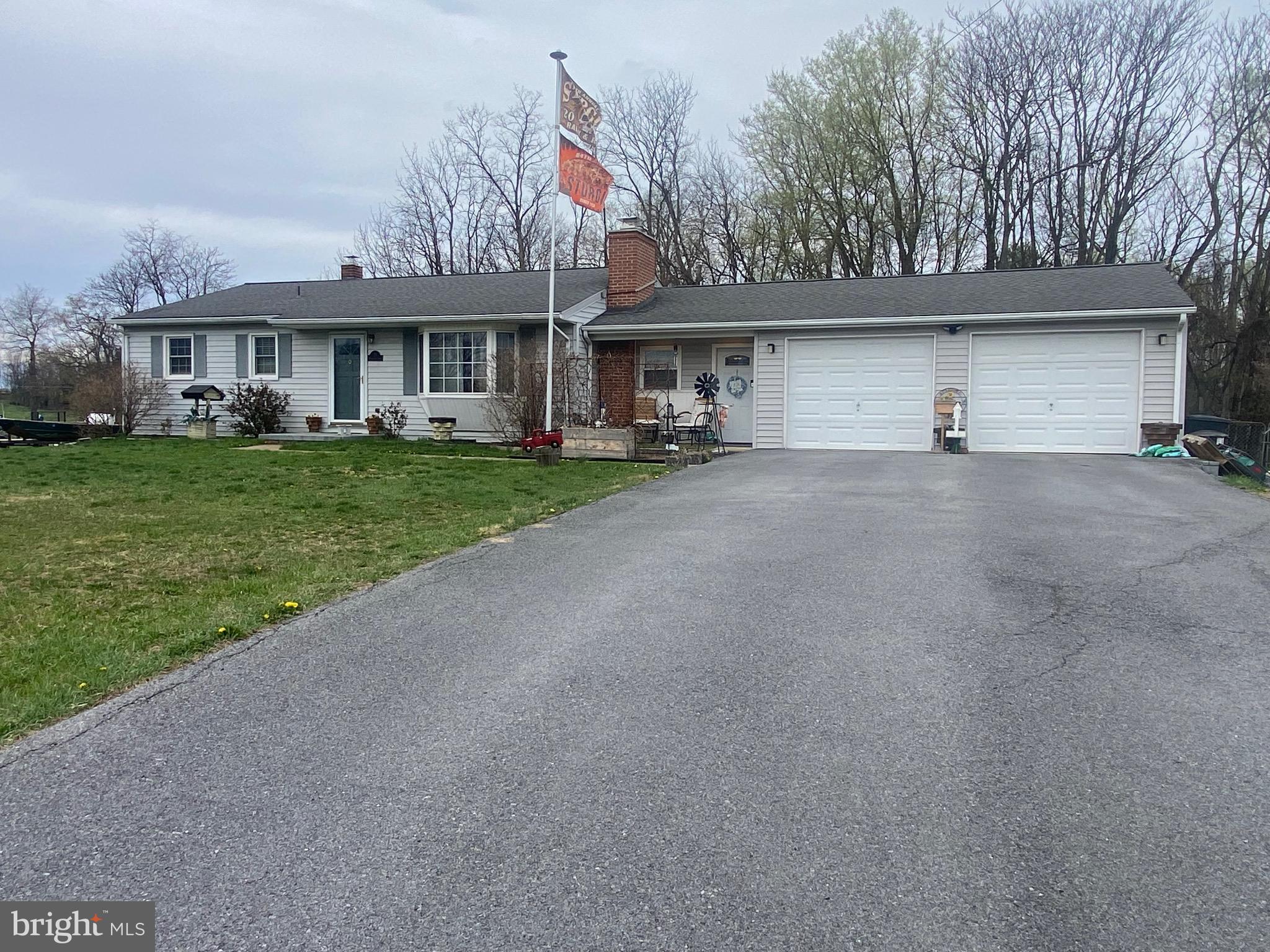 Single level living in rural area of Jefferson County! This home offers a large country kitchen that is perfect for gatherings or entertaining, 3 bedrooms conveniently located on the Main Level and a large, fenced yard with a patio and hot tub to enjoy quiet evenings. There's also a spacious 2-car garage and finished breezeway/mudroom to clean off before entering the home. The finished basement offers a family room with bar and pool table, and 2 bonus rooms that can be used as a study, workshop or crafting room. Updated flooring, newer roof and HVAC.