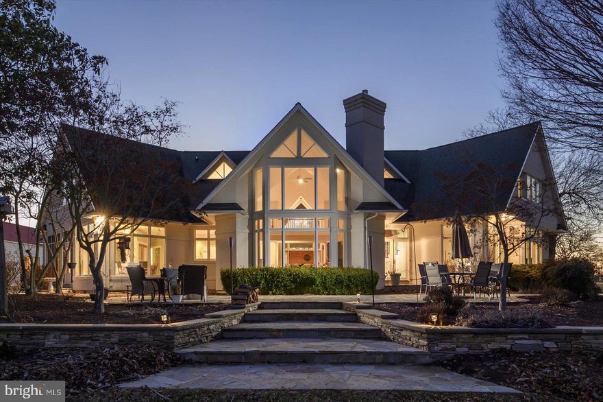 Spectacular 30-Acre Waterfront Estate on Cox Creek — 5 minutes from the Chesapeake Bay Bridge:
A rare opportunity to own a breathtaking 30-acre waterfront retreat with 1,000 feet of shoreline partially rip-rapped, a private dock with boat lift,  ample docking area and stunning panoramic views. This exceptional property features a luxurious contemporary residence, a charming three-bedroom cottage, a massive multi-use pole barn, and a two-story event lodge, making it THE ultimate escape for entertaining, multi-generational living, a private sanctuary, a farmette…endless possibilities exist! The main residence spans across 3,800+ sq. ft. — with 4-bedrooms, 3 full and 2 half-baths — oriented  to showcase the waterfront setting. The main level features a grand living area with soaring cathedral ceilings, a gas fireplace, and wall-to-wall water views. The open concept provides an easy flow to the formal dining room, the gourmet kitchen and the adjoining breakfast area. Tucked away, off the kitchen, is a three -season porch which is THE perfect spot to drink your coffee, read a book or catch up on the latest! The main floor also offers a flex room which could be used as a library/office, den or formal living room. A luxurious primary suite with stunning water views and a spa-like en-suite bath for the ultimate retreat is the grand finale to the main floor, which is serene, spacious and bathed with natural light. Upstairs, you'll find three spacious bedrooms, each with breathtaking water views, and two full baths. There are multiple closets with ample storage space.  The additional buildings offer endless possibilities. The Three-Bedroom Cottage is ideal for guests, extended family, or possibly rental income. The Event Lodge is a versatile two-story space, with the main level designed for large gatherings, entertaining or a large game room, and with the upper level offering a spacious room that can be used in multiple ways. office, guest rooms, game rooms, or??  Lastly, the massive Pole Barn — currently used for farm vehicle and boat storage boasts an  over-sized workshop  which could stay as is or be converted to serve a number of alternative uses! 
A Waterfront Paradise Awaits You, call or message for a private tour!