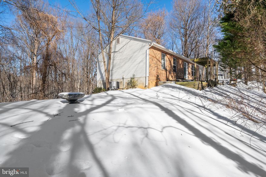 Welcome to your own peaceful retreat in desirable Northern Calvert County! This stunning, semi-secluded single-family ranch style home, set on a sprawling 2.17-acre property, offers the perfect blend of privacy and convenience. Boasting 5 spacious bedrooms and 3 full bathrooms with a fully finished walk-out basement and a new open concept living/dining area, this property has undergone some major renovations and is ready for its new owners. Recent renovations include addition of kitchen cabinets, brand new flooring, paint, some trim, and several doors throughout. A new dishwasher, microwave and cooktop. For additional peace of mind, both the roof and HVAC system were updated within the last 5 years. 
Enjoy the tranquility of this expansive lot while being mere blocks away from the beautiful Chesapeake Bay. The vibrant, charming communities of Chesapeake Beach and North Beach are just minutes away, offering a variety of shopping and dining options. 
This move-in ready home is an exceptional opportunity for those seeking a quiet oasis with modern updates and easy access to local amenities.