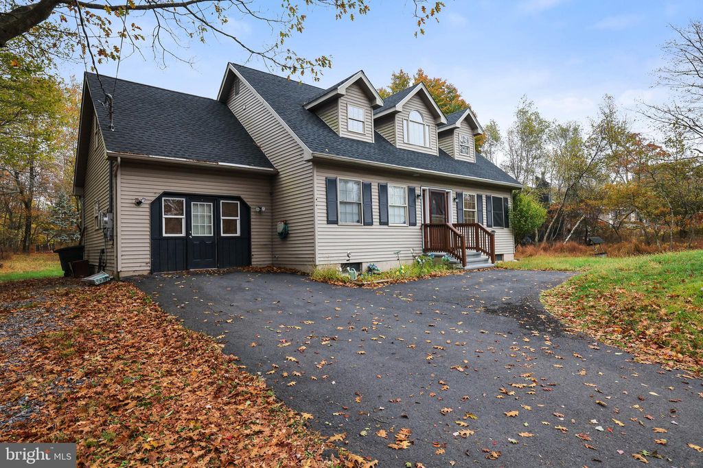 Photo of 306 Cedar Drive, LONG POND, PA 18334 (MLS # PAMR2005688)