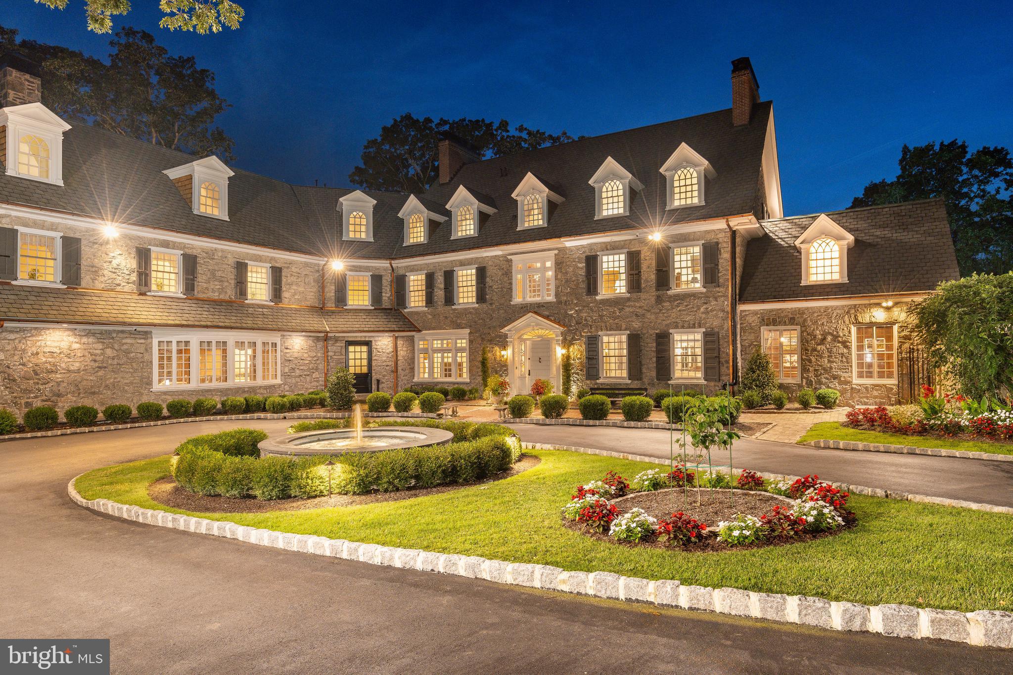 “Second Tamora,” originally known as Ederllyn, was built in 1898 by Edward B. Smith of Smith Barney as a private retreat in the heart of Gwynedd Valley. With nearly 3.5 acres of landscaped grounds, this historic stone manor has hosted luminaries such as Princess Grace of Monaco and General Douglas MacArthur, adding to its remarkable provenance. A gated entrance, winding tree-lined drive, circular courtyard, and fountain lead to the stately façade of 18-inch granite walls. Inside, a marble foyer, hand-painted millwork, and 10 distinctive fireplaces set the tone for expansive formal and informal rooms, more than 8 bedrooms, and 7 full plus 2 half baths. Extraordinary details—three staircases, a wine cellar, catering kitchen accessed by original barn doors, and formal gardens—are found throughout. Recent ownership has fortified the estate with substantial investments: a new carport, irrigation and uplighting, extensive landscaping, and advanced water-management systems. Patios and decks were structurally reinforced, the 50-foot outdoor pool and spa underwent a full restoration, and outdated knob-and-tube wiring was removed. Two commercial-grade generators now ensure uninterrupted comfort. Inside, kitchen walls were thoughtfully opened to enhance flow, seamlessly blending historic character with modern livability. Additional amenities include multiple entertaining spaces, and both grand and intimate rooms suited for today’s lifestyle. Located in the award-winning Wissahickon School District and close to top private schools, the property offers easy access to regional rail, major highways, golf, tennis, and an abundance of shopping and dining. Both timeless and refreshed, Second Tamora is a legacy estate—strengthened, safeguarded, and prepared for its next steward.