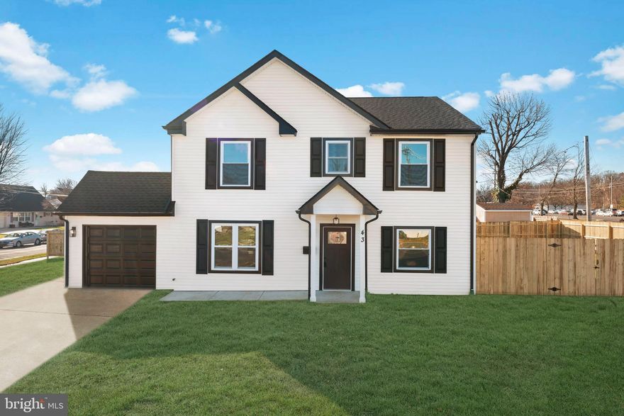 Welcome to this beautifully remodeled five bedroom, three full bathroom home in the heart of Levittown. From the moment you walk in, you will appreciate the thoughtful updates and spacious layout designed for modern living.

The first floor features new  vinyl flooring throughout and an open concept design that seamlessly connects the living room to the stunning new kitchen. Here you will find granite countertops, stainless steel appliances, a tile backsplash, and an impressive oversized island, ideal for everyday living and entertaining. The kitchen flows into a bright dining area with sliding doors that open to a fenced in backyard, perfect for outdoor gatherings. This level also includes two comfortable bedrooms and a full bathroom.

Upstairs, the second floor offers three generously sized bedrooms, all with recessed lighting and new carpeting. A beautiful hall bathroom with a tub shower combination, a convenient second floor laundry room with vinyl flooring, and a spacious primary suite complete the level. The suite includes a large walk in closet and an attached bathroom featuring tile flooring and a double sink floating vanity.

Additional highlights include a brand new driveway and an oversized one car garage. This home is truly move in ready, every detail has been thoughtfully finished so you can simply unpack and enjoy.