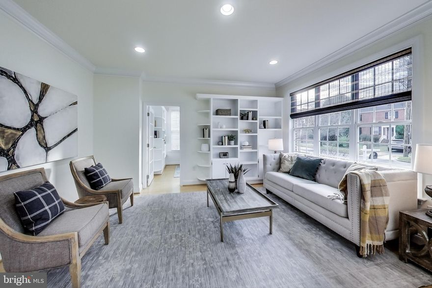 Rarely Available Home In WHITMAN SCHOOL CLUSTER! Impeccably maintained with original owners, this classic colonial shows like new. Walk up the custom brick stairs and step into a sweeping foyer with cathedral ceilings, gleaming hardwood floors and an abundance of natural light. Directly off the foyer is a living room that connects to a private office/library with custom built-ins and a door for privacy, perfect for working from home. Continue through the house to a formal dining room with hardwood floors and crown molding with easy access to the gourmet kitchen. No lack of counter space here with a large granite island and separate breakfast room with access to the back patio for al fresco dining. Get warm by the gas fireplace in the spacious family room with a flick of a switch and cozy up with a drink from the dry bar. Head up the sweeping staircase and find 4 large bedrooms, the first complete with an en-suite bathroom, complete with a custom walk-in tub/spa. Next to those, two full sized bedrooms, both with large closets and  a shared hall full bathroom with dual sinks for convenience. Finally, take in the breathtaking owner's suite with a large sitting area and gas fireplace. An en-suite bathroom with seperate powder room, dual sinks, Jacuzzi brand soaking tub and walk-in shower creates a spa-like atmosphere. His and Her walk-in closets and a bonus room that would be the perfect nursery or office complete this dream bedroom. In the basement you will find a finished recreation room with an additional storage and nearly 500 additional square feet of living space. A 2 car garage located in the back of the house finishes this beauty. Located steps away from Suburban Hospital, NIH and public transportation. Highly desirable school district, close to world class shops and restaurants, don't pass this one by.