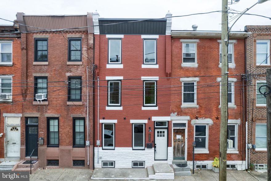 Ask listing agent for special financing opportunities!  

Welcome to 1711 N 3rd Street, in the heart of Olde Kensington- one of the hottest neighborhoods in Philadelphia. 
This freshly rehabbed property is ready for you to come see it in person and feel right at home.  

As you enter the property,  the open layout of the living space flows right into the kitchen is an entertainers dream layout.   The living room space has a custom accent wall with a built in electric fire place.   The exquisite kitchen has calacatta quartz countertops with the waterfall feature down the side and custom made solid plywood kitchen cabinets.  The 1/2 bath is conveniently located on the first floor, as well.     
The 2nd level has 2 generously sized bedrooms along with the 1st full bath and a laundry closet.  
The 3rd level welcomes you with a wet bar to have all your refreshments ready and available.    The master bedroom is accompanied with an en suite bathroom, stand up tiled shower and double sink feature.   
The outdoor space of the property is a large back patio with a built in garden space to let you savor this city oasis.  
The basement is completely finished with tile flooring to allow for storage, a 2nd living space, gym or an office space. 

Other major highlights of this property are: 
- Wifi video doorbell
- Dual zone heating/ac with nest thermostats.
- Wide plank, white oak engineered flooring throughout
- Custom railings
