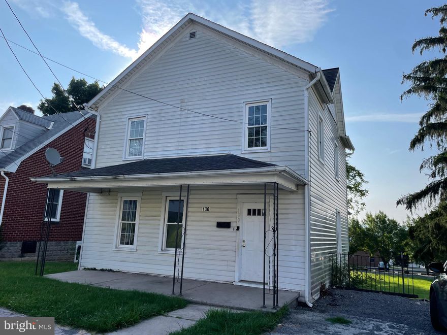 Smack, dab in the “Center” of things!  Large 4 bedroom home on a flat lot.   Currently rented for $1000/month, this home can serve as a great investment or a family home.  Walking distance to Frostburg State University, parks, restaurants, shops and the Western Maryland Rail Trail.