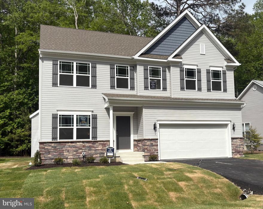 Welcome to Gemcraft’s newest addition to Ocean Pines!  As you walk into the Hamilton , there is a choice room that’s open to the foyer. Use this space as a formal living room or playroom for the kids. Down the hall is the great room containing a fireplace, making an inviting space to gather with the whole family, which opens up to a classically designed kitchen.  A small mudroom at the entry to the garage rounds out this flexible first floor. Following the stairs to the second floor, you find the Owner’s Suite and three additional bedrooms, all with ample closet space, plus a laundry room, essentially located at the end of the hallway for convenience and ease. The Owner’s Suite  was designed to be a private haven, offering a walk-in closet brimming with storage space,  an en suite Venetian style bath , with a large glass enclosed shower. Enjoy this award-winning, amenity-filled community,  just minutes from the beaches of Ocean City and Assateague Island National Seashore.  A Gemcraft Smart Home Program Bundle is included, plus ask about our Builder Incentives!  Some photos shown are of a similar completed home.