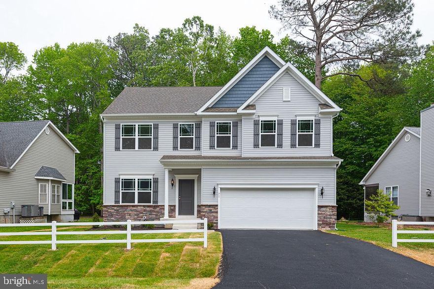 Welcome to Gemcraft’s newest addition to Ocean Pines!  As you walk into the Hamilton just complete! There is a choice room that’s open to the foyer.  Use this space as a formal living room, office or playroom. Walk down the hall to the great room containing a built-in contemporary fireplace, making an inviting space to gather with the whole family.   Classically designed kitchen with island, breakfast bar and pantry.  A small mudroom at the entry to the garage rounds out this flexible first floor. Following the stairs to the second floor, you find the Owner’s Suite and three additional bedrooms, all with ample closet space, plus a laundry room, essentially located at the end of the hallway for convenience and ease. The Owner’s Suite  was designed to be a private haven, offering a walk-in closet brimming with storage space,  an en suite Venetian style bath , with a large glass enclosed shower. Enjoy this award-winning, amenity-filled community,  just minutes from the beaches of Ocean City and Assateague Island National Seashore.  A Gemcraft Smart Home Program Bundle is included, plus ask about our Builder Incentives!