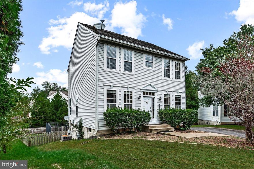 PRICE DROP!! This inviting home nestled in a cul-de-sac features a fenced-in backyard with an in-ground pool, surrounded by upgraded metal fencing. Enjoy a spacious deck overlooking the pool, perfect for relaxing or entertaining. Inside, find ceramic tile in the kitchen and bathrooms, a cozy fireplace, and a gas range stove. The partially finished basement with a walkout adds extra space. Nine-foot ceilings on the main floor and in the bedrooms. This home features a paved driveway with ample parking. Located minutes from I-95 for easy commuting, shopping, and schools, it’s ideal for easy living.