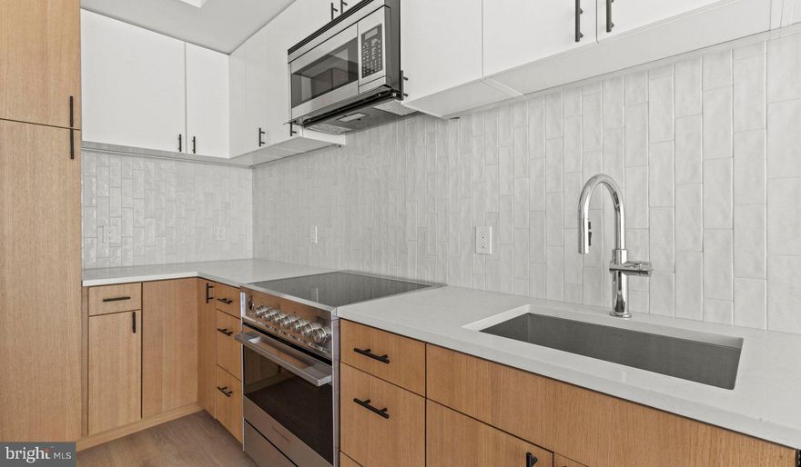 Look-and-Lease Incentive until January 5th 2025. We can honor the current $500 credit to encourage quicker decision-making for moving fees. All T-unit levels will come with a Martha Stewart induction cookware set upon move-in.

2 Months FREE Rent, conditions apply.

Nestled in the heart of Bethesda, Maryland, Ravel and Royale offer an unparalleled living experience that seamlessly blends luxury, nature, and culture. This duo of naturally inspired apartment communities is situated in the vibrant Strathmore Square, providing residents with a truly balanced lifestyle.

Ravel, an intimate boutique community of 49 homes, features sophisticated 2+ bedroom residences with spacious layouts and expansive balconies and terraces that invite the outside in. Royale, on the other hand, offers a diverse range of living spaces from studios to 3-bedroom apartments, catering to various lifestyle needs.

Both properties boast European finishes, generous terraces, and light-filled rooms that create an atmosphere of elegance and comfort. The thoughtfully designed interiors are complemented by an array of exceptional amenities, including a restorative dry sauna, a 24/7 fitness center, and a roof lounge offering sweeping views of the picturesque Rock Creek Park.

Residents of Ravel and Royale enjoy a lifestyle that harmoniously combines urban convenience with natural serenity. The unrivaled location, right at the Grosvenor-Strathmore Metro Station, ensures easy access to the wider Washington D.C. area while being tucked away in a tranquil neighborhood. The proximity to Rock Creek Park provides ample opportunities for outdoor recreation and relaxation, perfect for nature enthusiasts.

The Strathmore Square neighborhood is a haven for art and culture lovers. Through a unique partnership with the acclaimed Strathmore Music Center, residents receive exclusive access to diverse programming, including bi-annual sessions with a Curator Concierge, culturally-rich performances, and early offerings for premier seats. The community also hosts free evening concerts featuring Strathmore Artist in Residence alumni as part of the Music on the Square series, adding to the vibrant cultural atmosphere.

Living at Ravel and Royale means embracing a lifestyle where style, connectivity, and serenity converge. Whether you're unwinding in the restorative dry sauna, enjoying the panoramic views from the roof lounge, or exploring the nearby cultural attractions, every day offers new opportunities for enrichment and relaxation.

The surrounding neighborhood of Bethesda is known for its upscale dining, shopping, and entertainment options, further enhancing the living experience. With the perfect balance of urban amenities and natural beauty, Ravel and Royale provide an idyllic home for those seeking a sophisticated, arts-inspired living environment in one of Maryland's most desirable locations.

** Pricing and availability subject to change on a daily basis ** Photos are of model units ** Parking may be available for an additional fee **