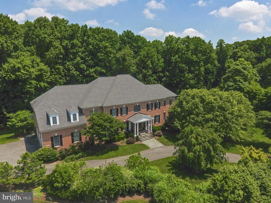 UNBELIEVABLE VALUE! - Over 8,000 finished square feet on 4+ acres in GORGEOUS gated community! Built in 2004 w/ OPEN concept and impeccably maintained. Features include DREAM master suite with 2 room-sized closets, chef's kitchen, main floor office and 1,759-bottle wine cellar. Four ensuite bedrooms on UL. Walkout LL with 5th BR & BA, PLUS home theater, gym and rec room. Lots more pics on Zillow!