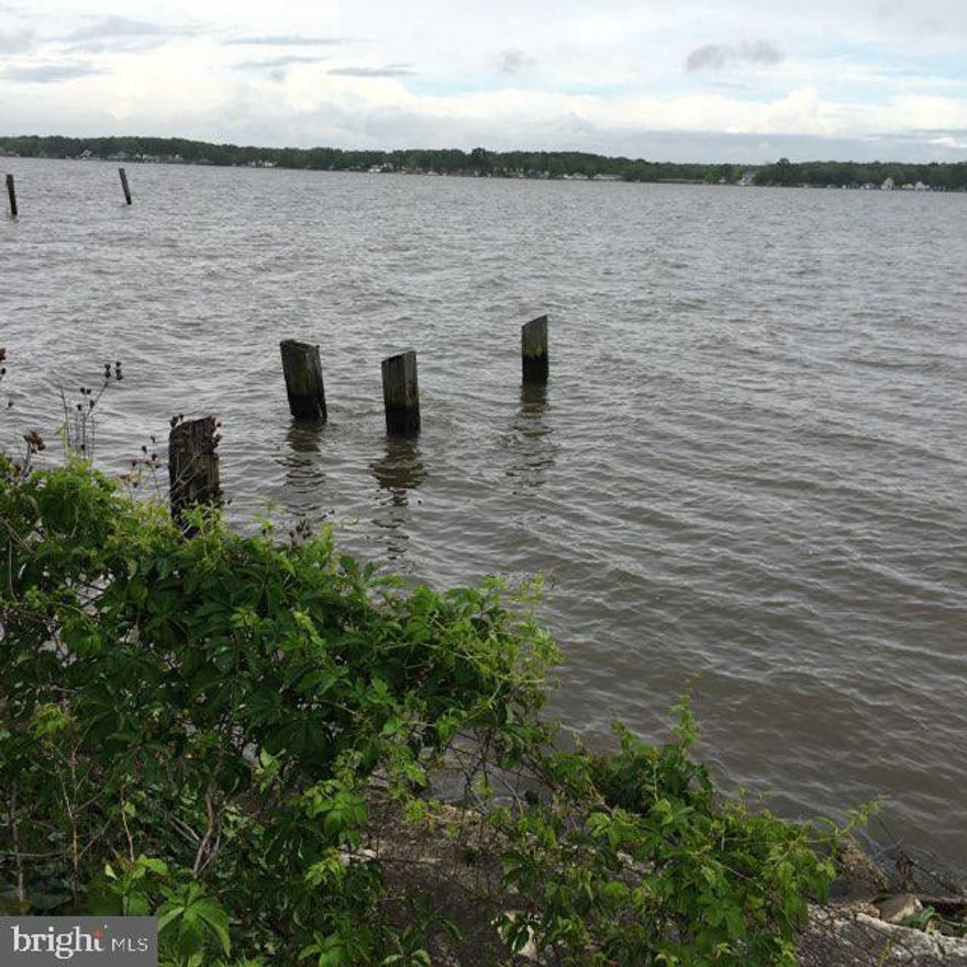 Have you been touring Baltimore County Waterfront Homes and can't seem to find the right one that checks all the boxes? If so, have you ever considered purchasing a waterfront lot and doing a design build home for yourself? With this opportunity here on Lynhurst Rd you build your own dream home, wake up and  fall asleep to the gentle sound of waves as well enjoy the  beautiful sunrises and sunsets over the water. Super convenient location just minutes off the Baltimore Beltway and easy access to Baltimore City amenities. Whether you're seeking a full-time forever home  or a weekend getaway, this lot is perfectly situated to cater to your every need. Private and direct access to the Back River and just a short trip and you're in the Chesapeake Bay. Imagine spending your days fishing, boating, or simply basking in the sun while taking in the panoramic views. Don't miss out on this rare opportunity to own a slice of coastal paradise. The tranquility of waterfront living, where every day feels like a vacation. Schedule your private viewing today and make your dream of owning a waterfront retreat a reality! Variance is completed however Buyers are to verify all zoning, planning, critical bay area and other agency requirements at the buyers own expense for permitting. The seller has a building plan that fits the building envelope available for the buyers use for permitting . Buyers are responsible for any and all costs.