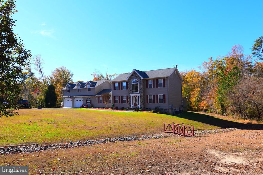 This property has it all. In law apartment, pole barn, stables and detached garage on 5.94 quiet acres with trails. Attached oversized 2 car garage as well.  Large home with theater room, sun room, den, and beautiful kitchen. So much outside living with pool, hot tub and fire pit! Plenty of room to plant gardens, ride 4 wheeler s or have livestock. No HOA. In law apt has its own heat pump.