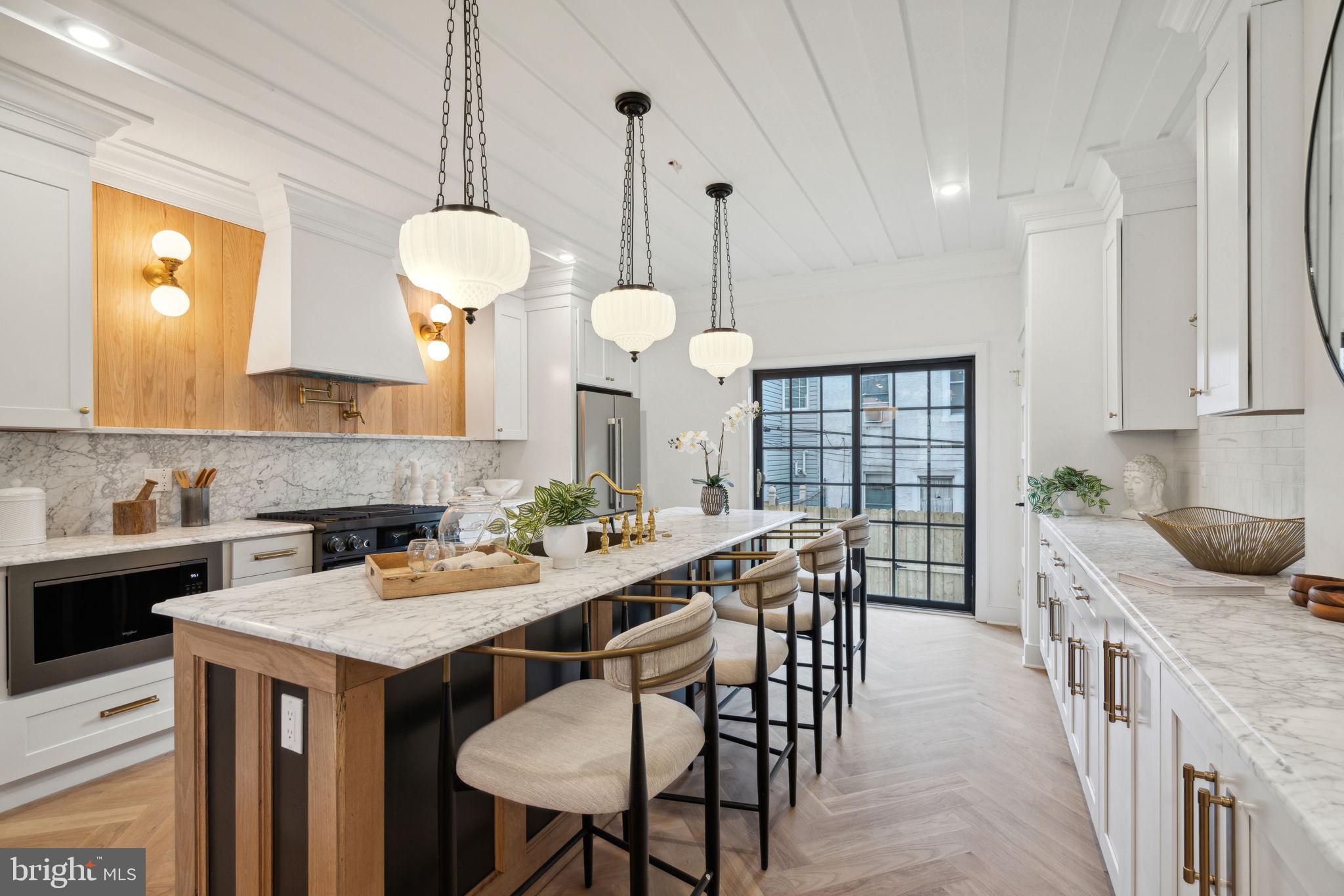 Welcome to this stunning new construction home in the desirable Graduate Hospital neighborhood of Philadelphia. This modern beauty boasts high-end finishes throughout, including hardwood floors, marble countertops, and stainless steel appliances. The open concept layout is perfect for entertaining, with a spacious living room, dining area, and gourmet kitchen. Step outside to your private roof deck, where you can soak in the breathtaking views of the city skyline. This home also features four bedrooms, 3 full bathrooms and a finished basement for added living space. Don't miss your chance to own this exceptional home in one of Philly's most sought-after neighborhoods. Property comes with a 10yr tax abatement.