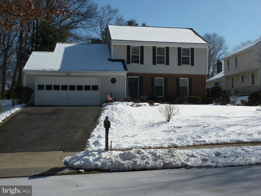 Lovely colonial home on great lot in sought after neighborhood!  This home features 4BR, 2 full baths and 2 half baths. Sweeping family room with gleaming hardwoods, cathedral ceiling and gas fireplace.  Tiered deck w/gazebo is sheer perfection for entertaining.