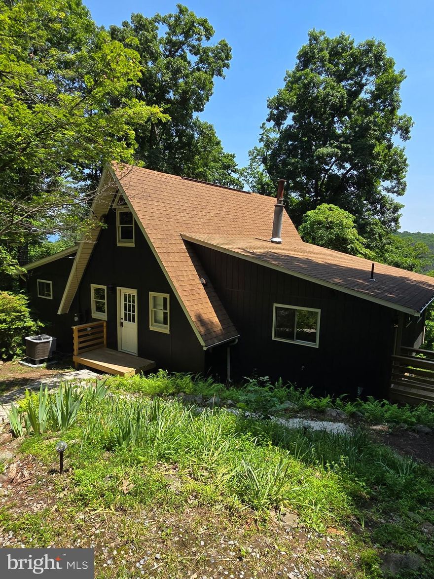 Wow!! Completely remodeled home with almost everything being brand new from the new roof and central air (HVAC ) system to the beautifully remodeled floor plan with updated kitchen with granite counter tops and stainless steel appliances, new bathrooms, new flooring and paint both interior and exterior. Some new windows, new hot water heater and all new plumbing and insulation. 3 New decks built overlooking the beautiful outdoors.  Professionally done and ready for you. Home features 2 beds and 2 baths on the main level as well as a loft which will make a great 3rd bedroom or office area. Also, a new sunroom off your spacious living room area.  Home is a must see and located in sleepy hollow with all its great lake front amenities.