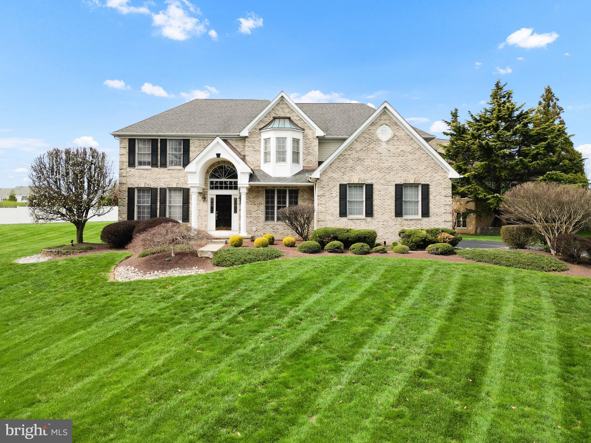 (Open House 04/06 12pm-3pm)
Welcome to this breathtaking 4-bedroom, 2.5-bathroom stone front corner property nestled in the highly sought-after Northampton Crossing community.
This colonial center hall has been freshly spruced up and ready to impress. Step inside to the grand 2-story foyer that sets the stage for elegance at every turn.
The formal living and dining rooms flank either side, perfect for hosting soirées or family gatherings. Gleaming hardwood floors lead you to the heart of the home—the spacious family room, where soaring ceilings and expansive windows let in abundant natural light, creating a dramatic and inviting atmosphere. A stunning marble wood-burning fireplace adds warmth and charm to this impressive space. Adjacent to the family room, you'll find a private office/den—perfect for remote work or a quiet retreat. The sparkling white kitchen has just been tastefully updated with brand-new countertops and a gorgeous herringbone backsplash, making it both stylish and functional. A back stairway off the kitchen provides convenient access to the second floor. The home also features a mudroom and laundry room connected to the 2-car garage, offering additional storage and easy living. Upstairs, the spacious master suite is a sanctuary, featuring two walk-in closets, a sitting area, and a spa-like bathroom with pristine white fixtures. Three more generously sized bedrooms and a unique hallway bathroom complete the upper level. Downstairs, the expansive unfinished basement is just waiting for your personal touch, while the brand-new HVAC system ensures comfort year-round. Step outside to the expansive backyard, where endless possibilities for landscaping, outdoor entertaining, or even building your dream oasis await. This home combines the perfect blend of sophistication, functionality, and comfort, all in a highly desirable location. Don’t miss your chance to make it yours!