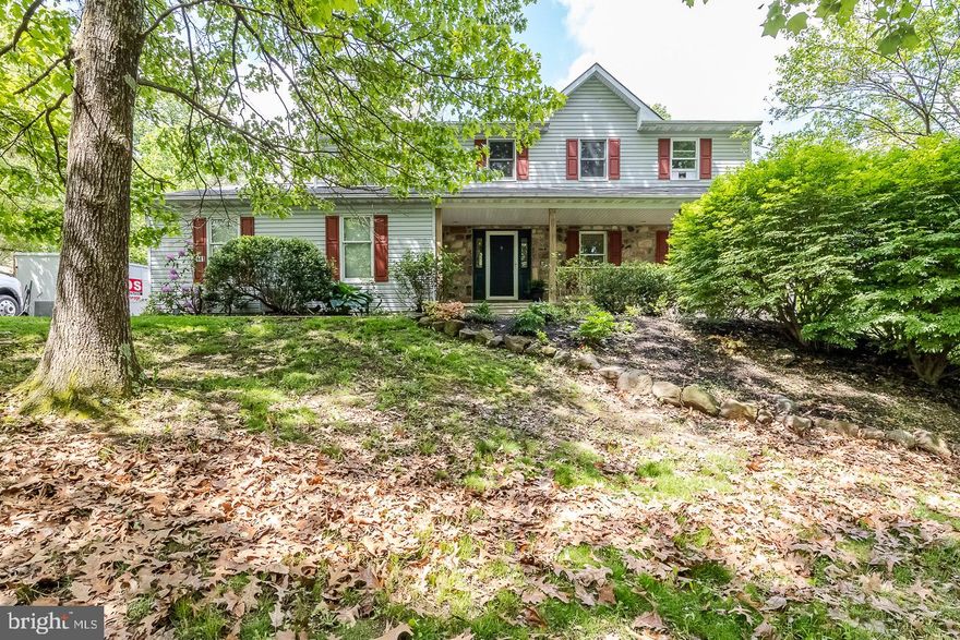 Welcome to your dream home nestled in the heart of the Owen J Roberts school district! This exquisite single-family abode sits gracefully on a 1.1-acre lot adorned with majestic, mature trees. This is not a driveby as the charm of the large covered front porch , perfect for enjoying your morning coffee or unwinding in the evenings, doesn't fully prepare you for the fully modernized interior space!  This smart home was designed with both attention to detail and functionality in mind while being beautifully appointed throughout using upgraded materials materials including luxury, high end lighting in every room!

Step inside through the inviting foyer and be embraced by the warmth of hardwood floors that sprawl throughout the main level.   Turn right into the large living room which flows seamlessly into the dining area,  ideal for hosting family dinners and celebrations.   The dining room features sliding glass doors that lead out to a sizable deck/patio with pergola combination, offering an inviting space for outdoor entertaining and al fresco dining.

The heart of the home is the expansive eat-in kitchen is recently updated and perfectly on trend with its center island, 42" cabinets,  stainless steel appliances, and ample counter space.  Coffee bar area and much more makes this a well functioning space.  Plenty of room for an eat-in table with natural light throughout, the space opens up to the great room with sliders to the rear patio and raised hearth stone fireplace.   Completing this level is a  half bath.

On the upper level carpeting, ceiling fans, and spacious closets adorn each of the four bedrooms. Enjoy the whimsical decor in the large full hall bath, boasting a single vanity and tub/shower combo, while a dedicated laundry area adds to the practicality of this floor.  The sumptuous master suite featuring a walk-in closet and a lavish master bathroom adorned with a sliding wood barn door. Indulge in the spa-like atmosphere of the master bath, complete with a large glass-walled shower, soaking tub, and single vanity, offering a serene sanctuary to unwind after a long day.

The lower level of this home presents endless possibilities with a fully finished basement, perfect for entertaining guests or creating a recreational space.  Jump right into sports or entertaining with the included multi-TV entertainment set up.  Full height allows you to walk outside to your side yard.  A convenient full bathroom adds to the functionality of this level and there is additional unfinished storage.

Experience the epitome of luxurious living combined with practicality in this meticulously crafted home, where every detail has been thoughtfully designed to elevate your lifestyle. Don't miss the opportunity to make this haven your own and create lasting memories in the heart of Owen J Roberts school district.