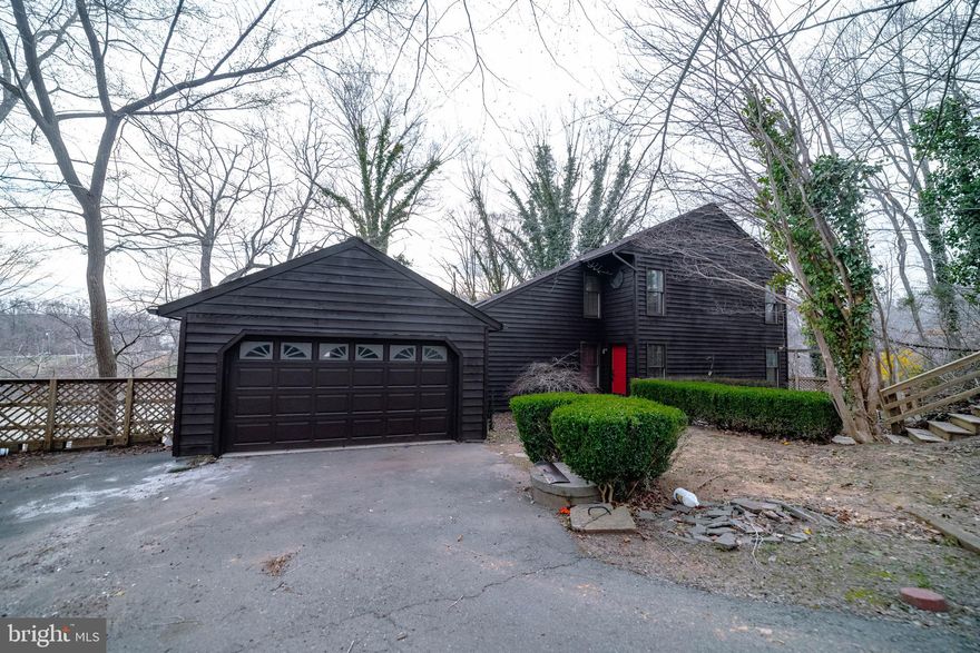 Welcome to this stunning mid-century modern waterfront home in the sought-after Occoquan
Forest community of Prince William County. Set on a serene 0.56-acre wooded lot along the
Occoquan River, this Waterfront residence offers rare architectural character, tranquil water
views, and a private dock-creating a true retreat while remaining close to everyday
conveniences. The home features spacious rooms, beautiful hardwood floors throughout the
main level, rich wood trim, and custom details that reflect timeless mid-century design. It has
two brand new HVAC systems and a recent roof replacement of architectural shingles with a
warranty that conveys. The hardwood floors have been refinished and new carpet and LVP
have been installed throughout the remainder of the house. It also has its own private dock, a
wraparound deck on the main level of the house and an extra large party deck by the water,
adding to the unique lifestyle this property offers. Sauna and pool table convey with house.
HOA is voluntary in Occoquan Forest community. Optional membership provides access to
private river amenities including a boat ramp, dock, canoe racks, playground, dog park, picnic
pavilion, and scenic walking trails. Occoquan Forest is known for its winding roads, mature
trees, and peaceful setting, all just minutes from shopping, dining, major commuter routes, and
the charming towns of Clifton, historic Occoquan, and Old Town Manassas. With easy access to
Route 123, Route 28, and the Prince William Parkway, this home delivers the perfect blend of
waterfront living, architectural charm, and commuter-friendly convenience. If you've been
searching for a distinctive home that offers privacy, natural beauty, and a vibrant community,
this waterfront gem is not to be missed. Antique truck in garage and pontoon boat by the dock
do not convey. House will be sold “AS IS.”