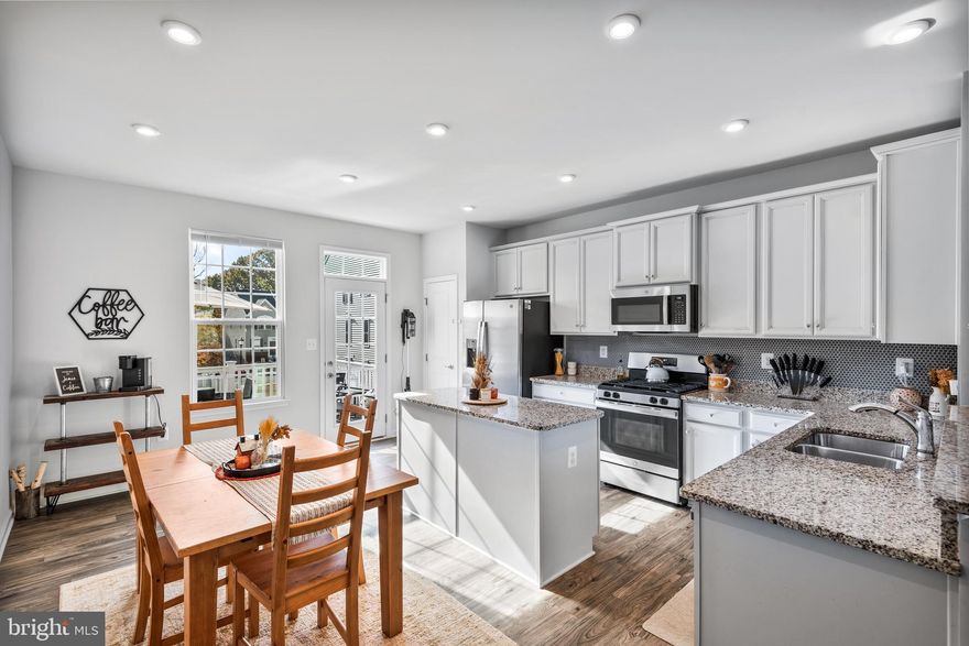 Back on the market due to unfortunate buyer finance reasons. NO FAULT TO SELLER.
One year young, this end unit town home still looks shiny new!  As you enter into the main level, you will   see the natural light pouring into the living room, kitchen and eating area.  The kitchen boasts granite countertops, gas range, matching appliances, island, bar seating, eating table area and door to the back porch! This home has 3 bedrooms and 3 full bathrooms, with upstairs laundry! Plus, there is a finished basement with walk out access to the backyard! Rappahannock landing offers a community pool, fitness center, recreation room and overflow parking!
One mile from I-95, for easy commute to Military bases, and DC! Close distance to shopping, library, hospitals, schools and downtown Fredericksburg!