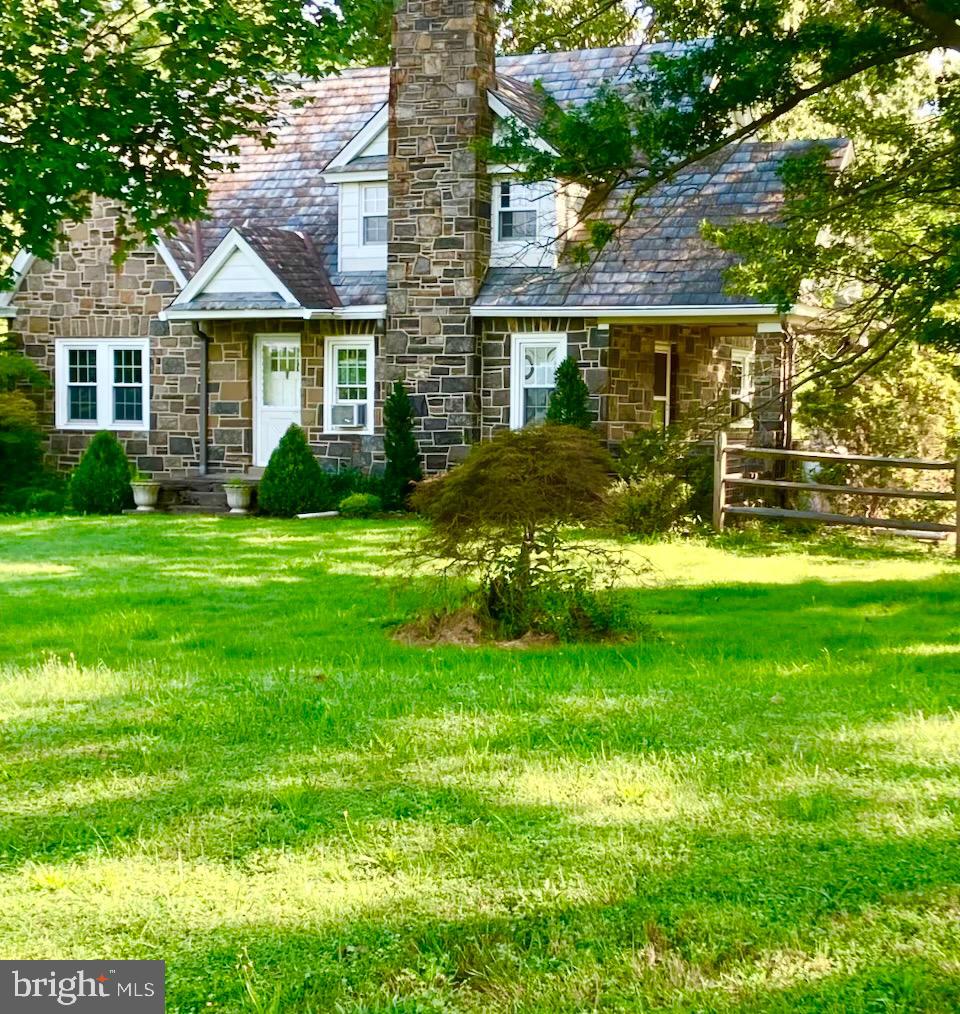 This Charming Craftsman Style Cape Cod Home, Circa 1940 Sits Perfectly on 7.20 Incredible Acres in Beautiful Doylestown Township, Bucks County! This Sweet Home Features Many Period Details. There's a Very Spacious Living Room with Plenty of Natural Sunlight, a Gas/Propane Stone Fireplace, and Access to a Covered Side Porch. There is a Full Dining Room with Plenty of Natural Sunlight from the Fabulous Bay Window. The Very Spacious Eat-In Kitchen has Oak Cabinetry, Granite Countertops, Recessed Lighting, Heated Tile Flooring, Large Double Window to Allow for Lots of Natural Light, and a Sliding Door with Access to a stunning 45'x14' Rear Deck. There is a Rear Foyer that Grants Access to the Rear Deck, Powder Room and Basement. The First Floor Also Has a Full Bathroom and One Bedroom. The Second Floor has Three Additional Bedrooms and another Full Hall Bathroom. This Home Comes with a Full Basement. AND LET'S NOT FORGET THE 4+ Car Garage/Workshop, this could be a Car Enthusiasts, Landscaper, Excavator or Builders Dream (so many possibilities) for that One Lucky Homeowner! The Morton Built Garage is 30' x 40' and comes with 10' Ceilings, Ceiling Fans, Double Insulated Ceiling/Walls, T1-11 Installed Walls, Wooden Ceiling Shelving around the Entire Garage for Knick Knacks and a Spacious Extended Concrete Patio with Full Overhang to enjoy those Beautiful Evenings Overlooking your Property. Pond in Rear of Property! ALL in Doylestown Township, Bucks County! *Sub-Division "May" Possible (please do your due diligence with the municipality prior to submitting an offer)! *Award Winning Central Bucks School District and Only Minutes from Historic Doylestown Borough! * Close to Shopping, Dining, Major Roads, and Public Transportation! The Possibilities for this Home and Property are Endless so Put on Your Thinking Cap, Bring Your Dreams and Don't Wait! Seller paid to bring public septic line to end of rear property and if new owner is interested in tying into public septic they would be responsible to pay the nominal amount to BCWSA to tie into house, do your due diligence with BCWSA for cost. NOTE: This Home/Garage/Shop is Being Sold in As Is Condition!