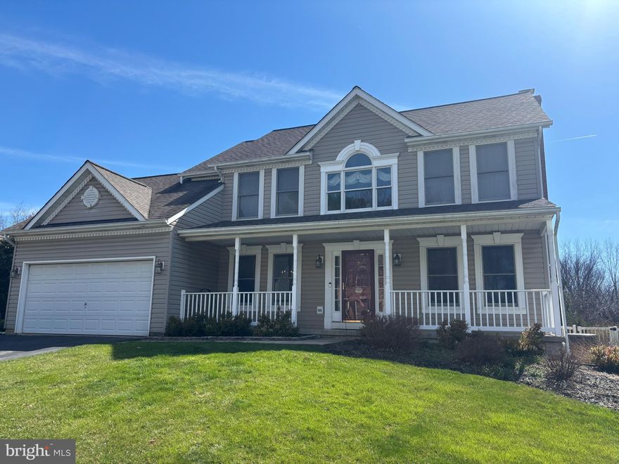 GORGEOUS QUAIL MEADOW COLONIAL! Welcome home to this stunning 4 bedroom, 2 full bath and 2 half-bath house, featuring almost 3000 square feet of finished living space. Freshly painted and move-in ready, this home has it all! Perfectly situated on a cul-de-sac, in one of Eldersburg's premier neighborhoods that boasts a walking trail, playground, basketball court, and pond. Step inside to the freshly painted home and hardwood flooring that everyone loves. The office, with built-in shelving, is ready for the "work at home" professional.  The open-concept kitchen flows smoothly into the family room and the sunroom for a huge space that is the centerpiece of the home. The kitchen has been updated with stainless steel appliances (all less than 2 years old), quartz counters, backsplash, and island with a granite counter. There is even a second island with stools, perfect for a quick bite, doing homework, or whatever you need it for! The sunroom addition with vaulted ceiling has 2 sliders...one to the Trex deck...and one to the stone paver patio. There are also plenty of windows, so you are always bathed in sunlight. The living room is centered by the brick, wood-burning fireplace and also has plenty of natural light. The formal dining room, half-bath, and laundry room round out a very spacious main level. Head upstairs to the 4 bedrooms! The large primary bedroom also has a vaulted ceiling and walk-in closet. It also has a fully remodeled (2024) en-suite bath that will knock your socks off! This stunner features dual vanities, a walk-in shower, porcelain tile, and a stand-alone tub. It is beautiful!  3 more sizable bedrooms are served by the hall bath that also has dual vanities and is nicely updated.  Heading downstairs to the fully finished basement, you will find another half bath, a large finished family room, and 2 different storage areas.  The outdoor space is amazing! There is a trex deck, and that is connected by a paver walkway to the paver patio, which is perfect for family gatherings, or just your quiet morning coffee. The flat, fully-fenced backyard is perfect for kids to play and pets to roam. All this, and only minutes from the fine dining and shopping that Eldersburg has to offer. There is easy access to 26 and 32, and a back way to Marriottsville and Route 70. This is a must-see!!