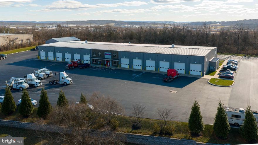 Class-A truck repair facility located approximately 0.5 miles from the PA Turnpike. Constructed in 2019 and currently leased to FleetPride, this facility was designed specifically for heavy-duty truck service and includes multiple full length drive-thru bays w/ 14' drive-in doors and a centralized office area with reception, lunchroom, locker room, and parts department. Additional features include heated shop and lobby floors, dedicated fiber optic connectivity, a natural gas backup generator, integrated security systems, and an approximately 3,750-square foot storage building with drive-in access. Ideal for investors or future owner-users.