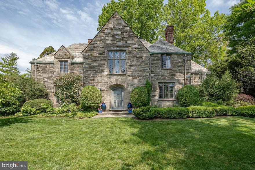 Among the many lovely streets of Merion, North Latches Lane may be one of the most desirable. This  gracious home sits on over an acre of beautifully manicured ground with many unique specimen plantings.  Special extra features of this home: Twinned high efficiency hot air, natural gas, electric baseboard in sunroom.   Cooling: 2 stage Carrier units. 3 fireplaces - 2 are wood, 1 is gas, 2 electric water heaters. Kitchen appliances - there is a side-by-side refrigerator, 48" stove which is dual fuel, 2 ovens one is convection, additional separate convection oven, microwave, dishwasher, refrigerated drawers, 2 washer, 2 dryers, Windows - casement, leaded glass, sliding wood frame (on sunporch).  This is an amazing house. Enjoy, it is a delight to see. Short distance to train.